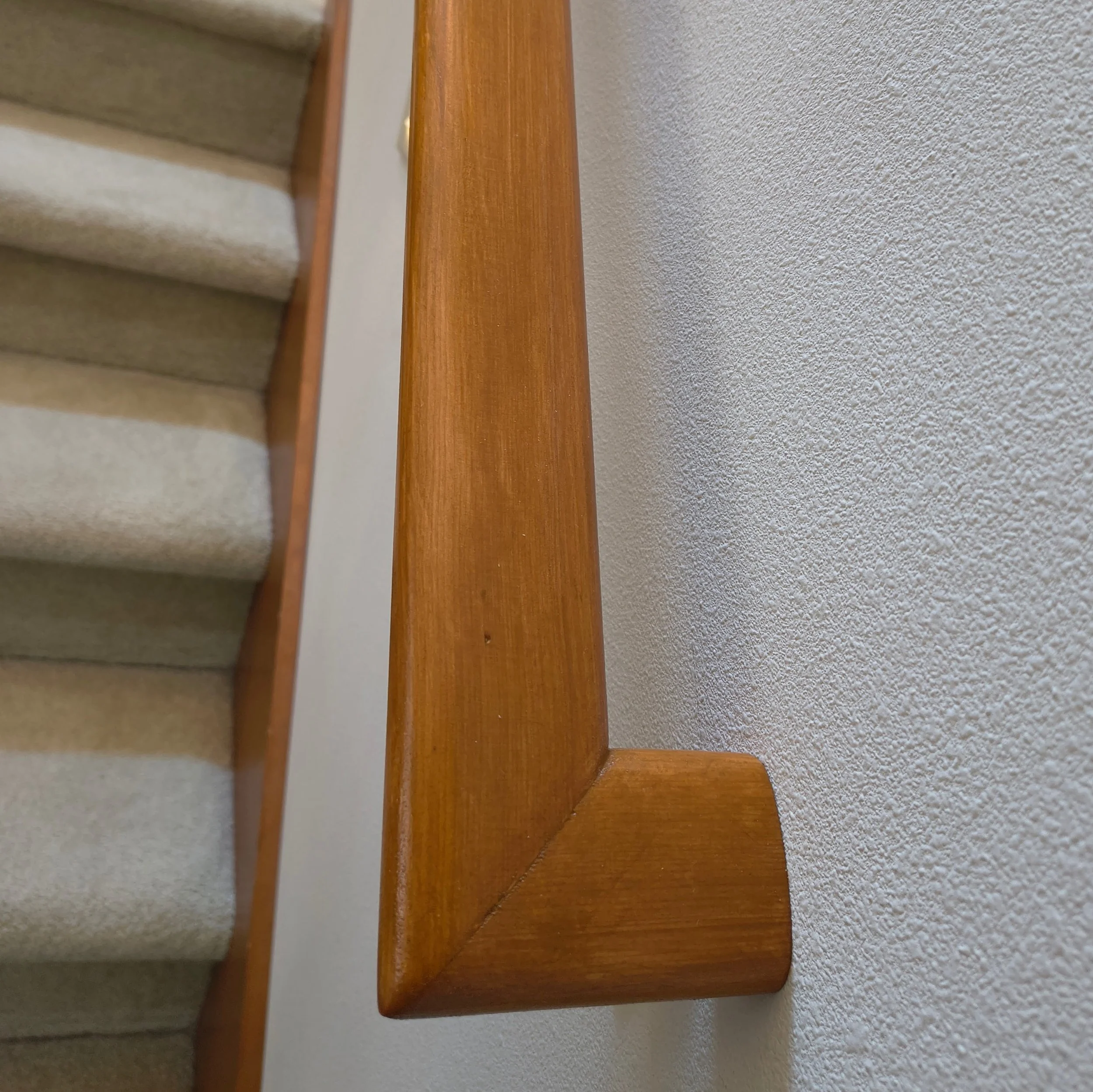 Interior handrail: Fabricate, custom-match stain, and install