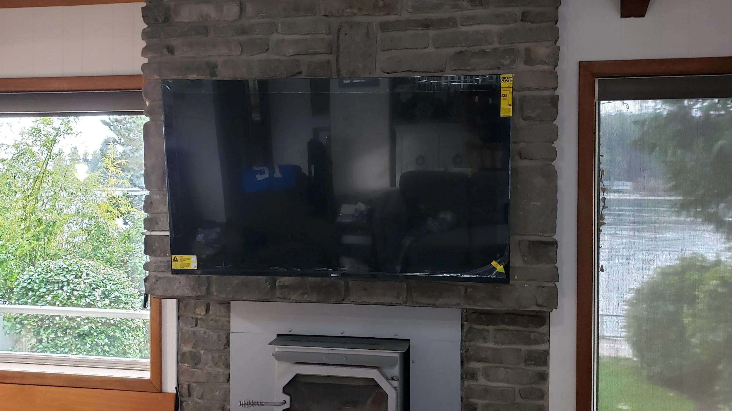 Mount TV on stone fireplace