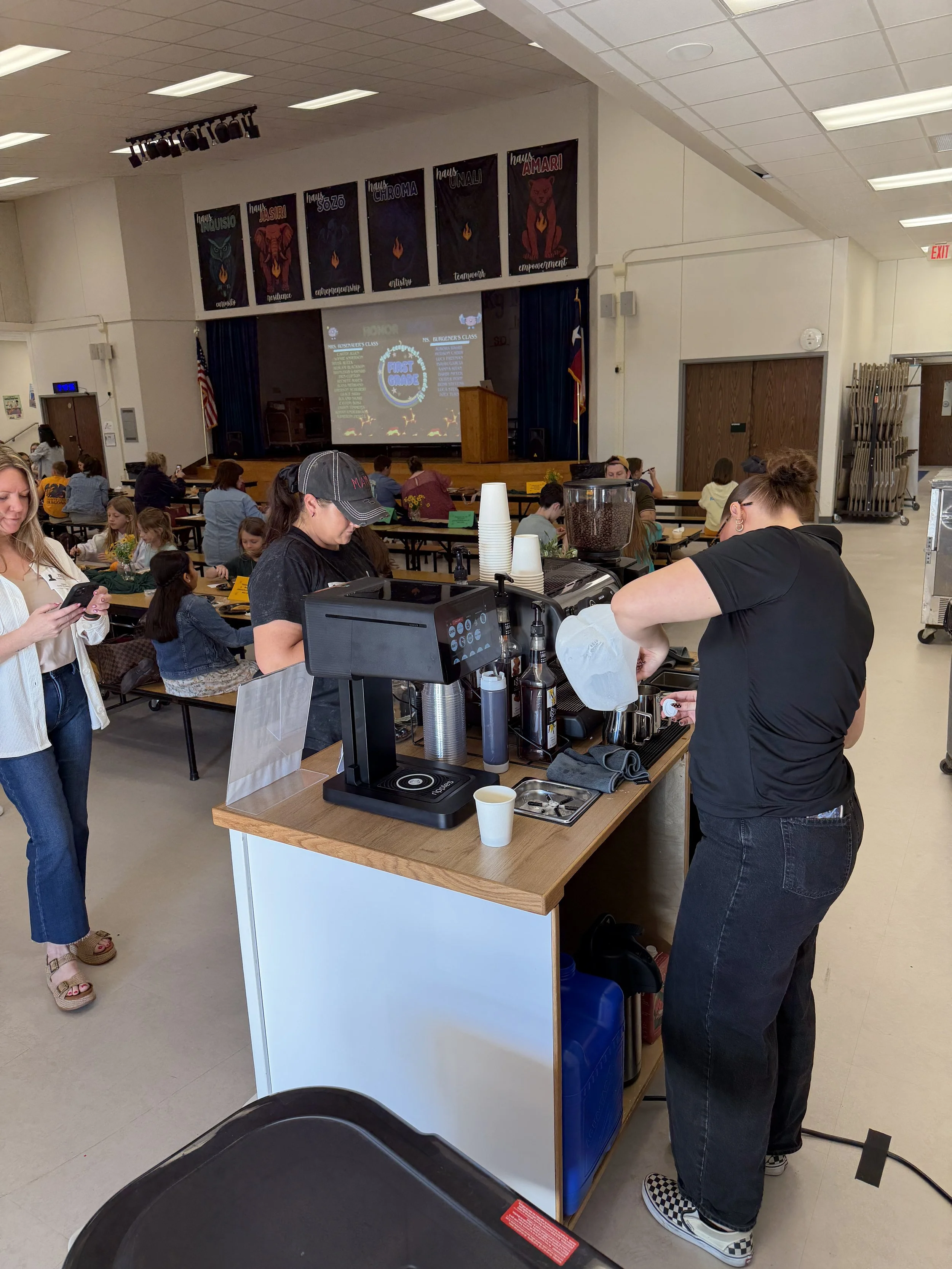 professional barista serving a corporate coffee catering event in san antonio