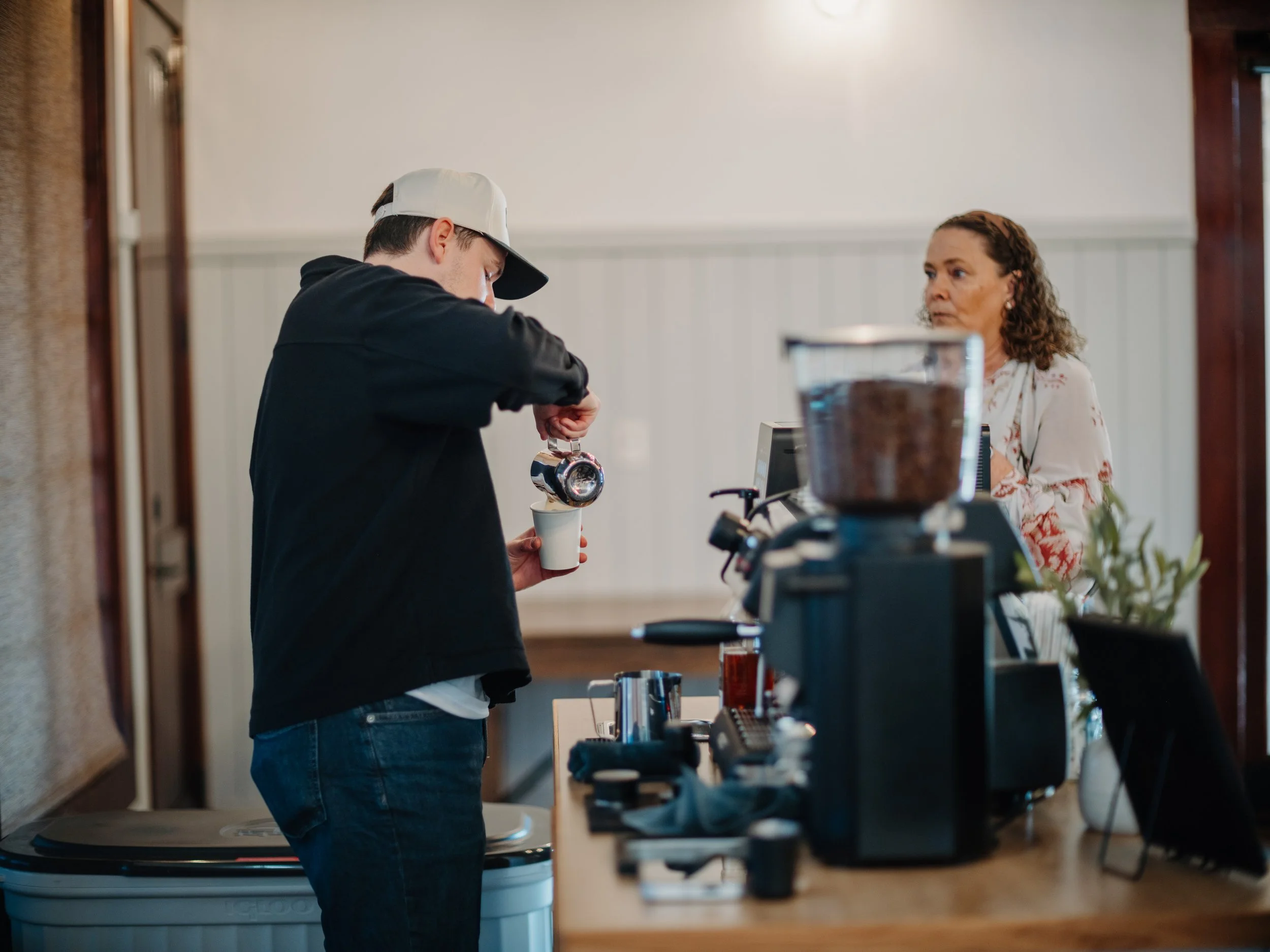 Barista interacting with customer in San Antonio