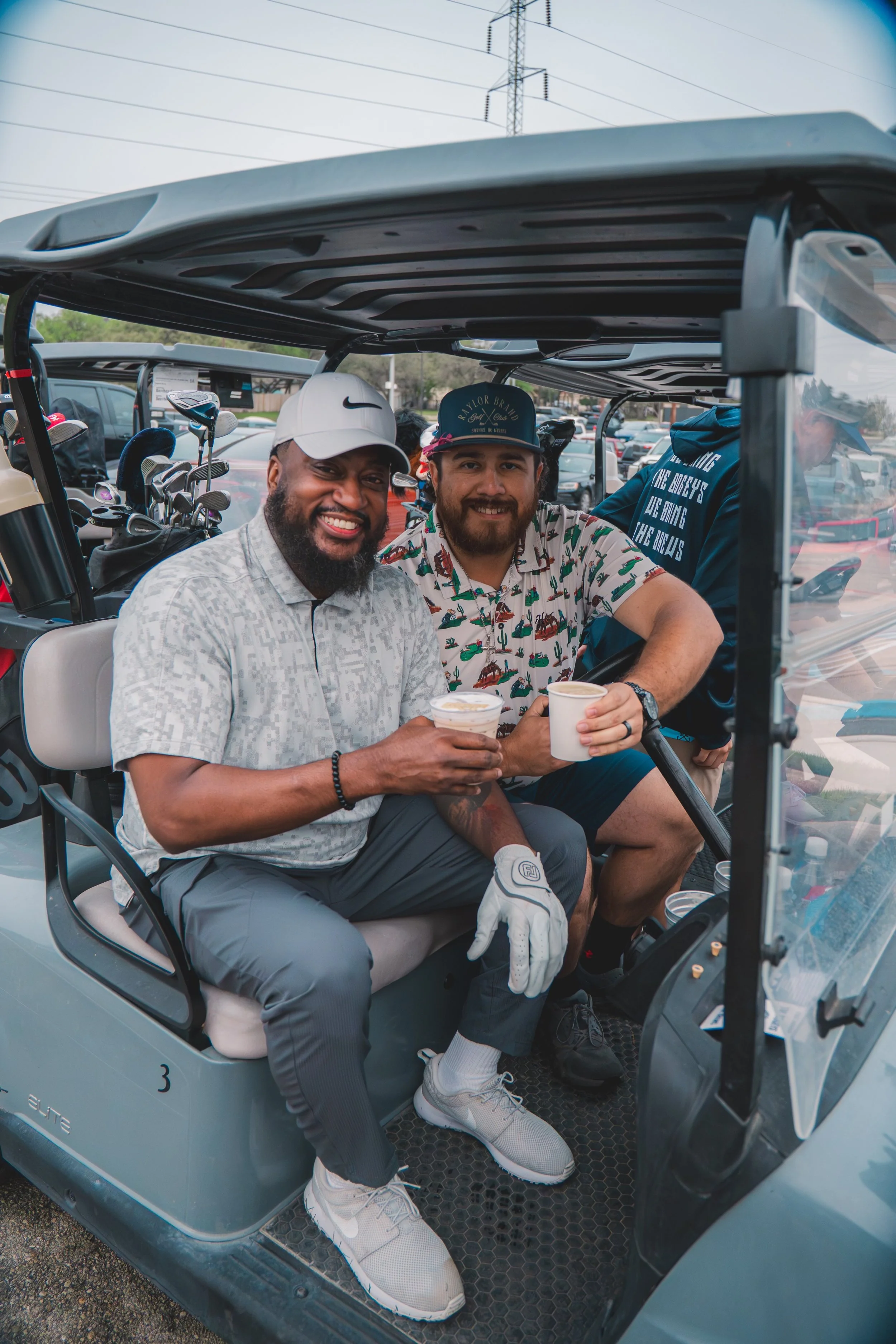 coffee brand activation in san antonio featuring two golfers in a golf cart