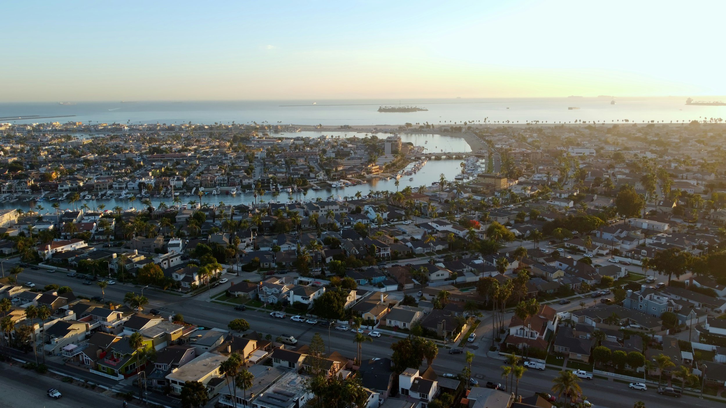 Aerial view of historic Long Beach, houses, streets, river and coastline