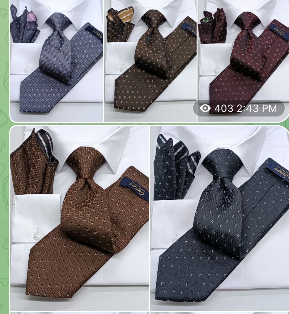 Four dress shirts each with a matching patterned tie in different colors: blue, brown, maroon, and black with cream, gold, gray, and white patterns respectively.