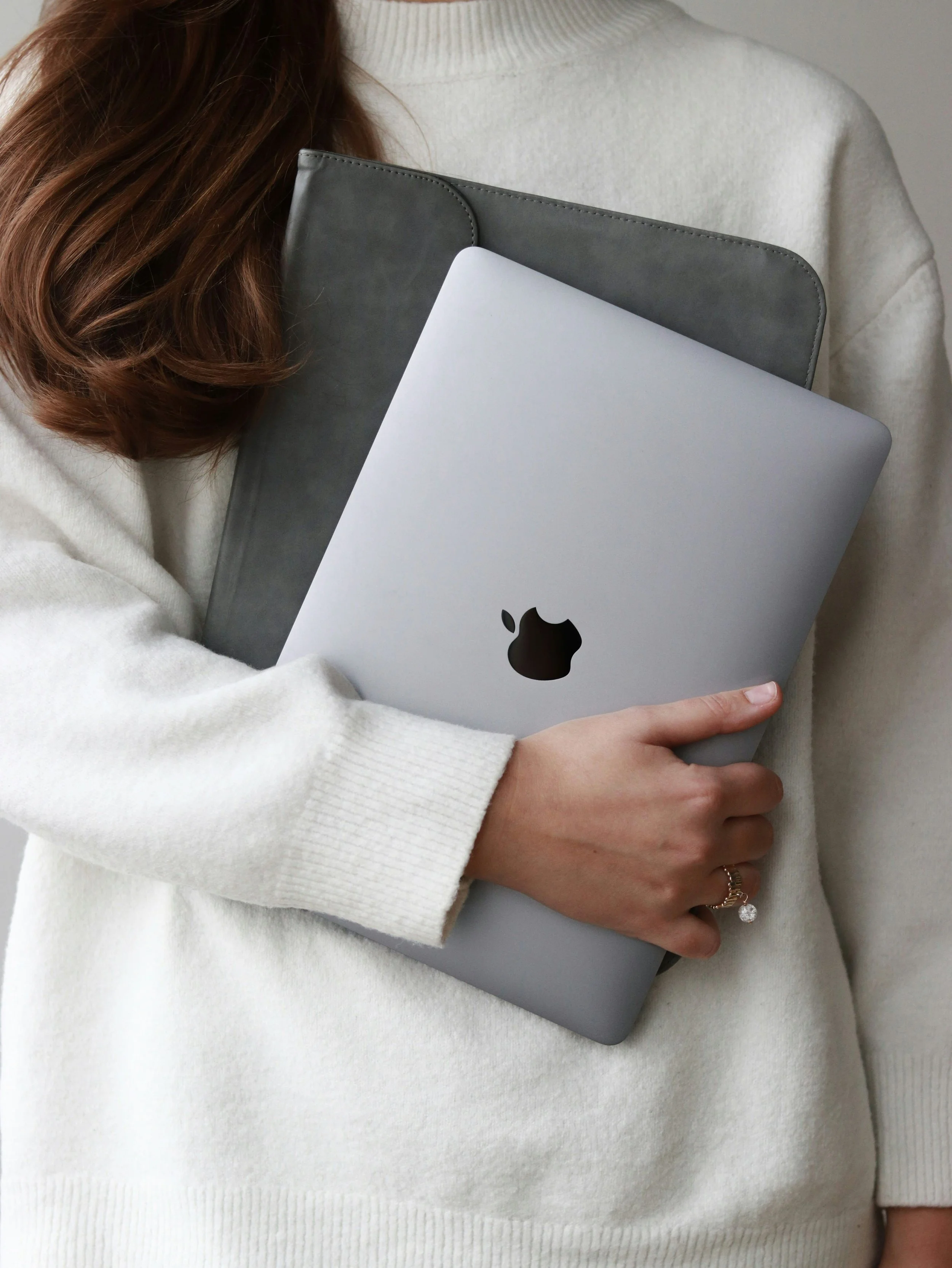 Woman holding a laptop
