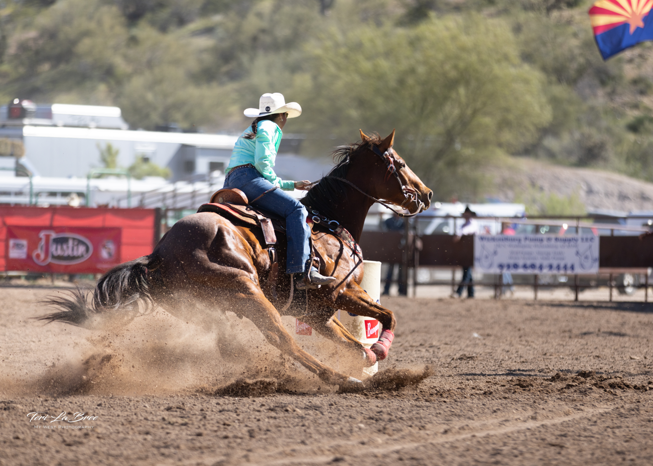 Barrel racing at the Legends of the West PRCA Rodeo in Wickenburg, Arizona