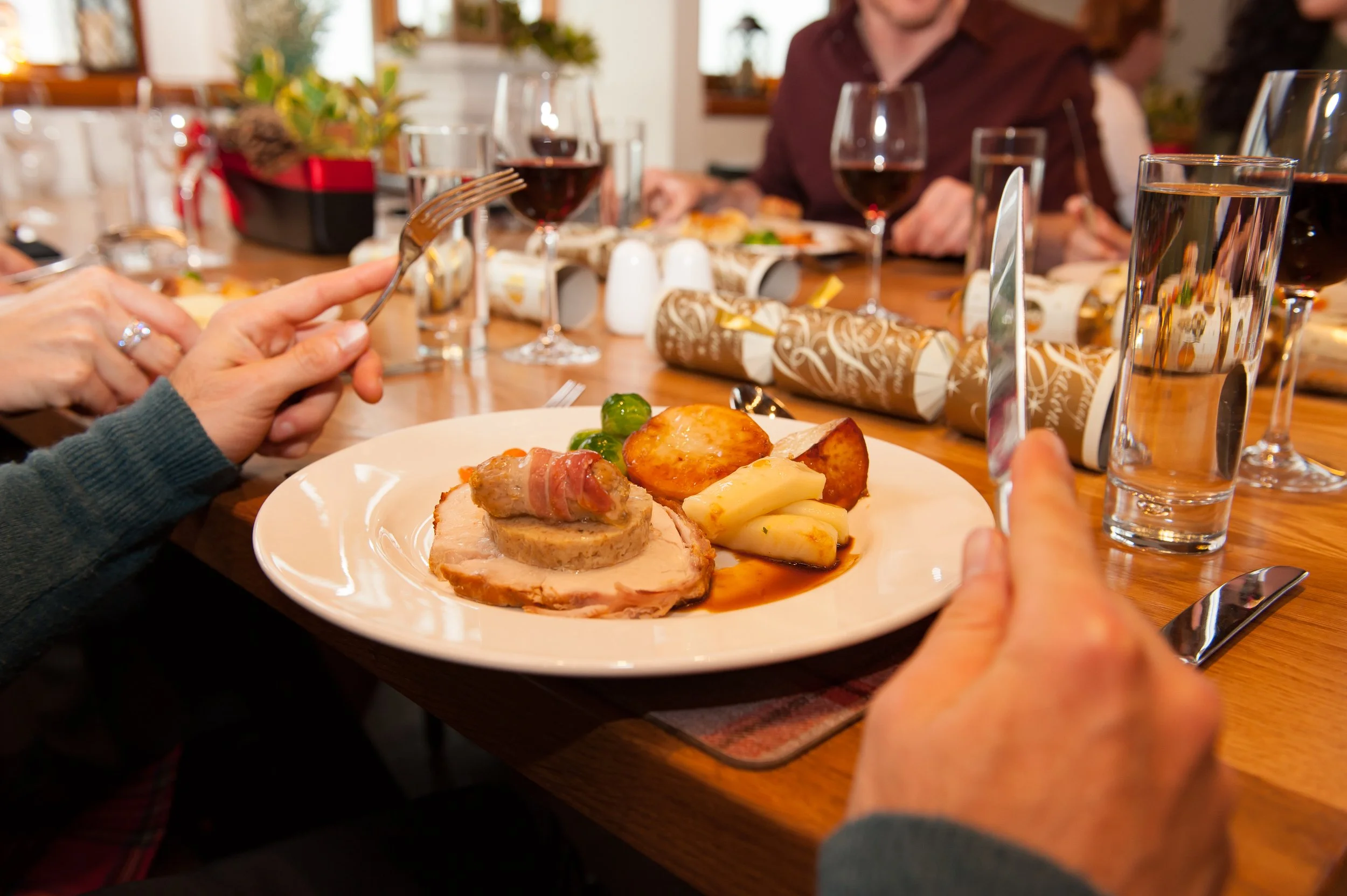 A food photography picture of a festive dinner table setting at Edinburgh Castle.