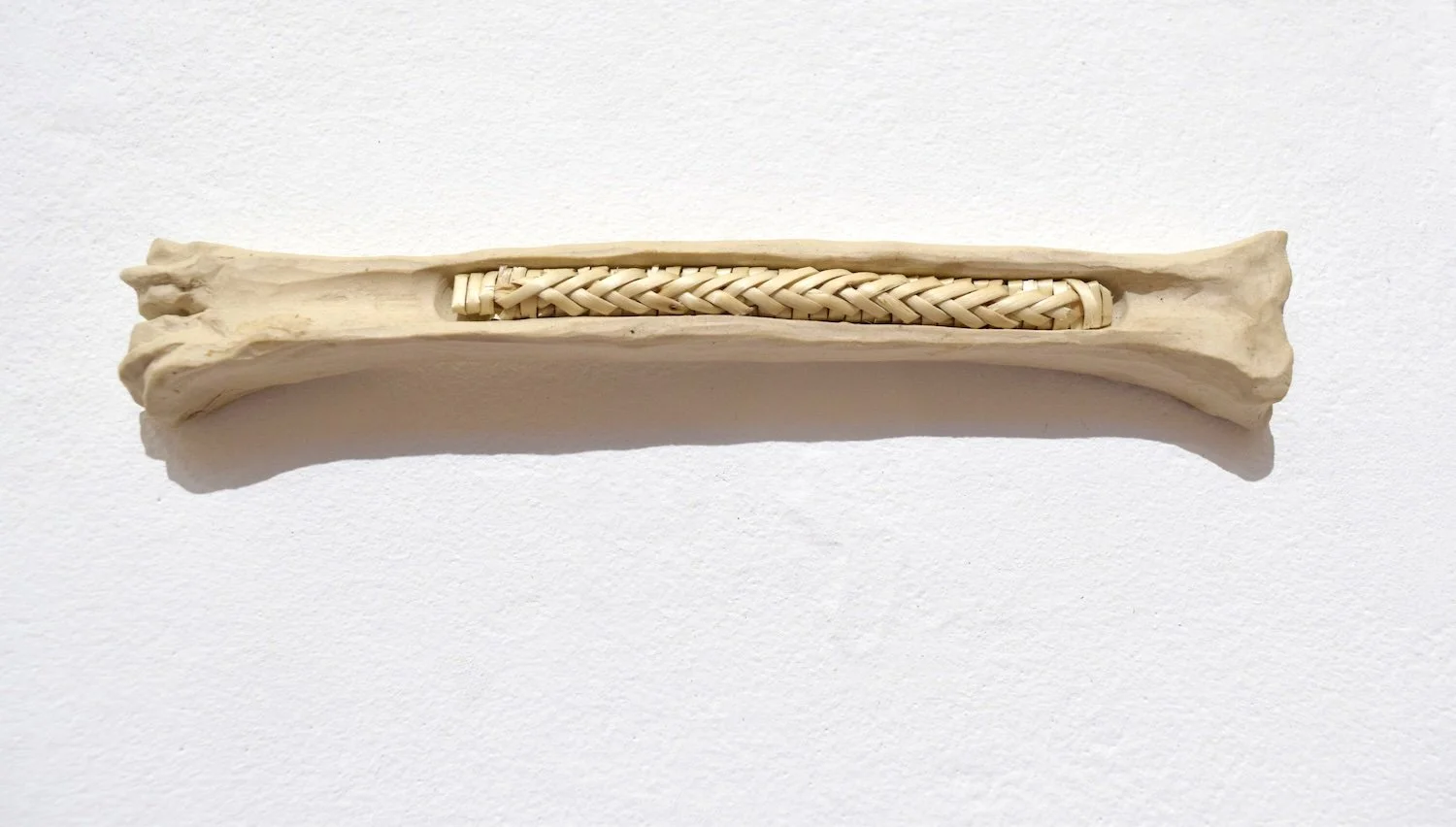 Marrow; ceramics, skeined willow; 7 ½” x 1” x ¾”
