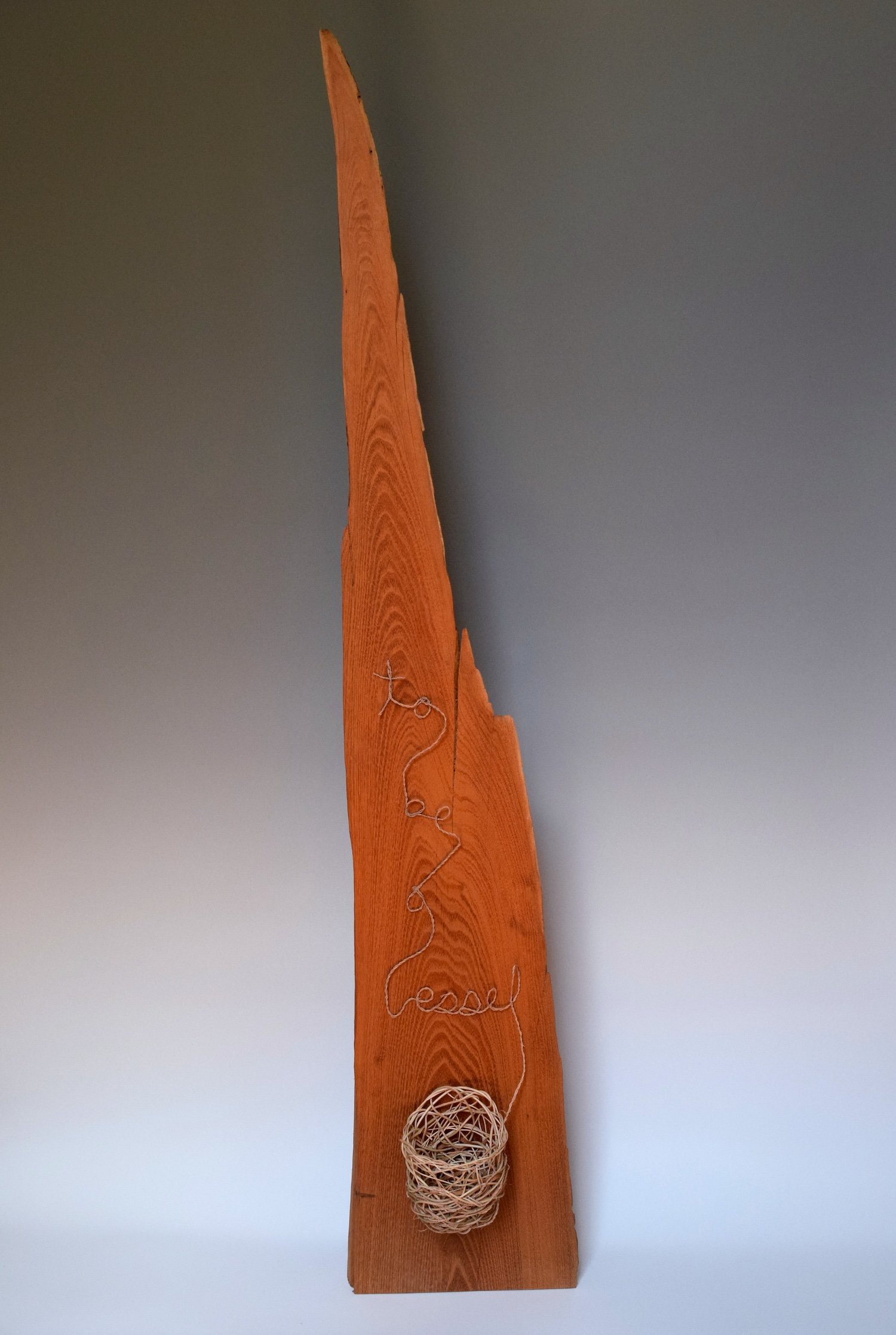 To Be a Vessel; locust wood, honeysuckle vine, elm inner bark, basswood cordage; 12" x 7" x 30"
