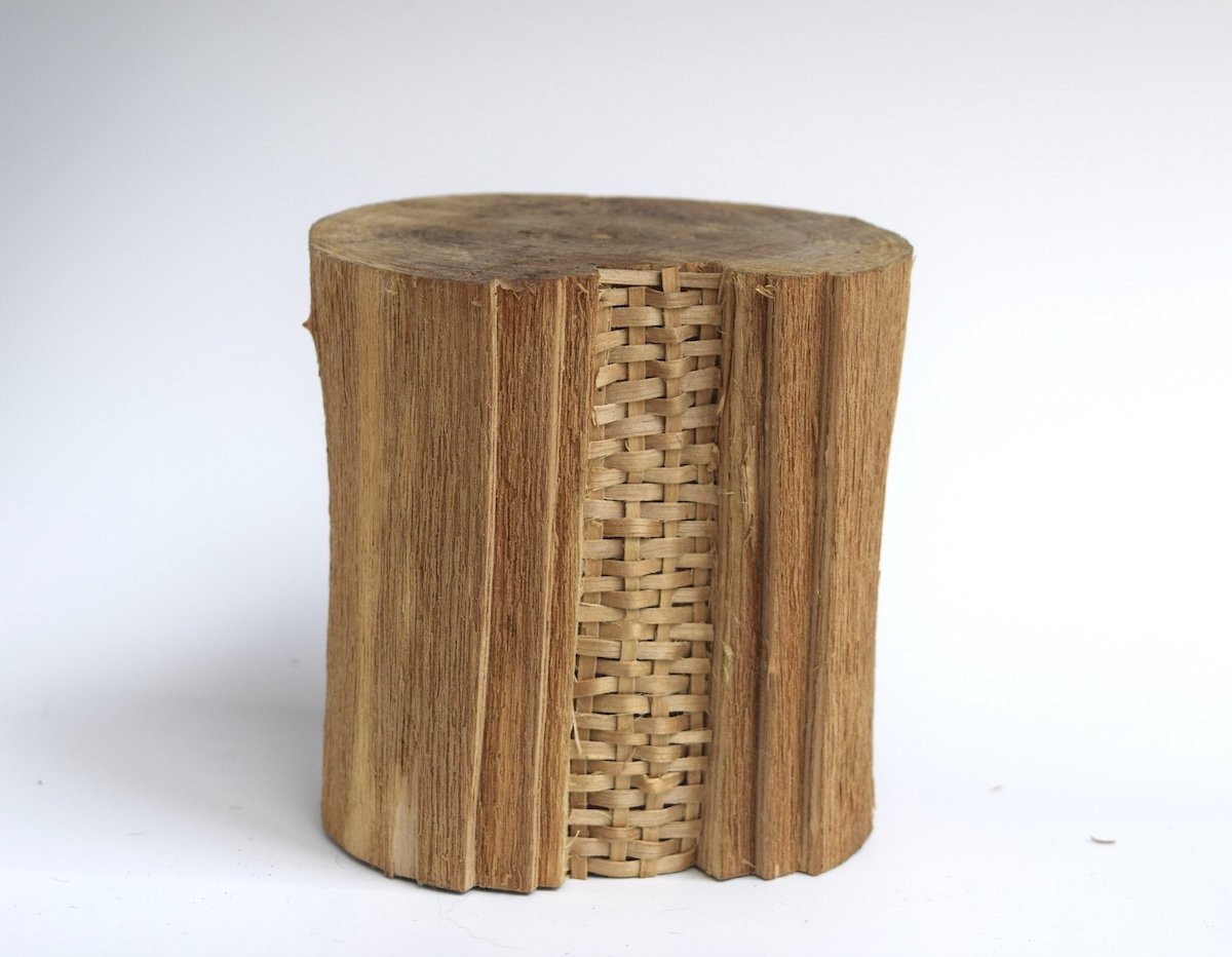 black ash woven into the middle of a piece of wood