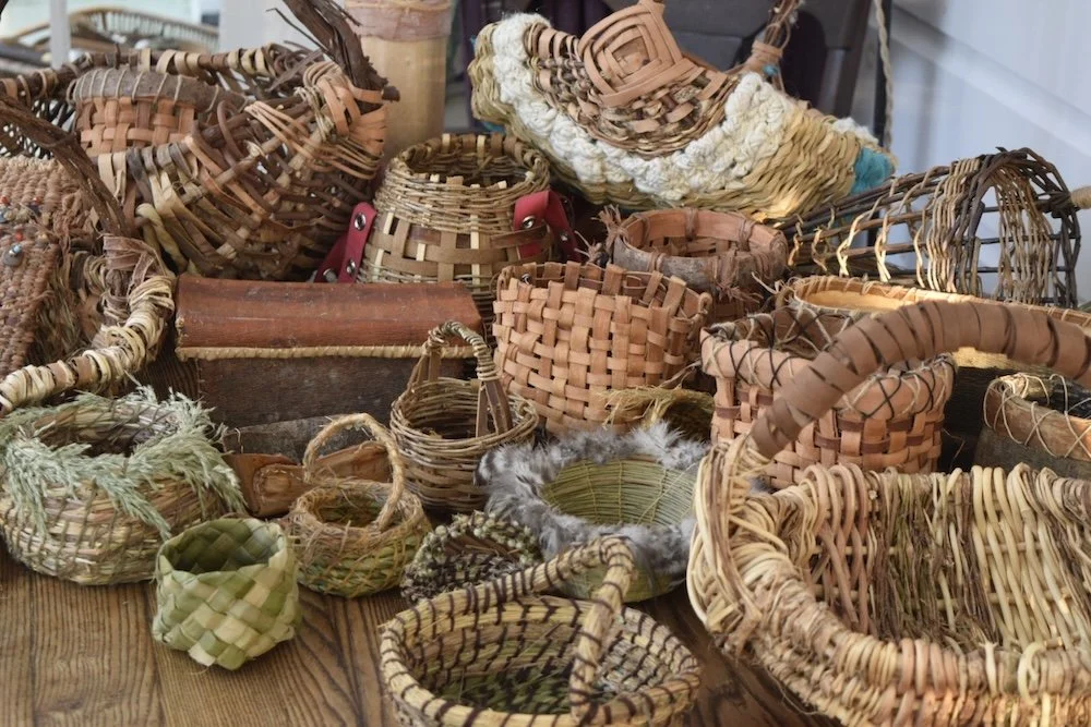 a buffet of many different types of handwoven baskets