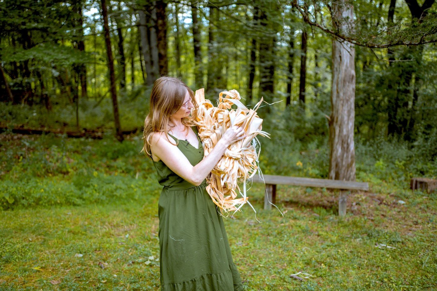 katie grove holding a bundle of basswood fiber