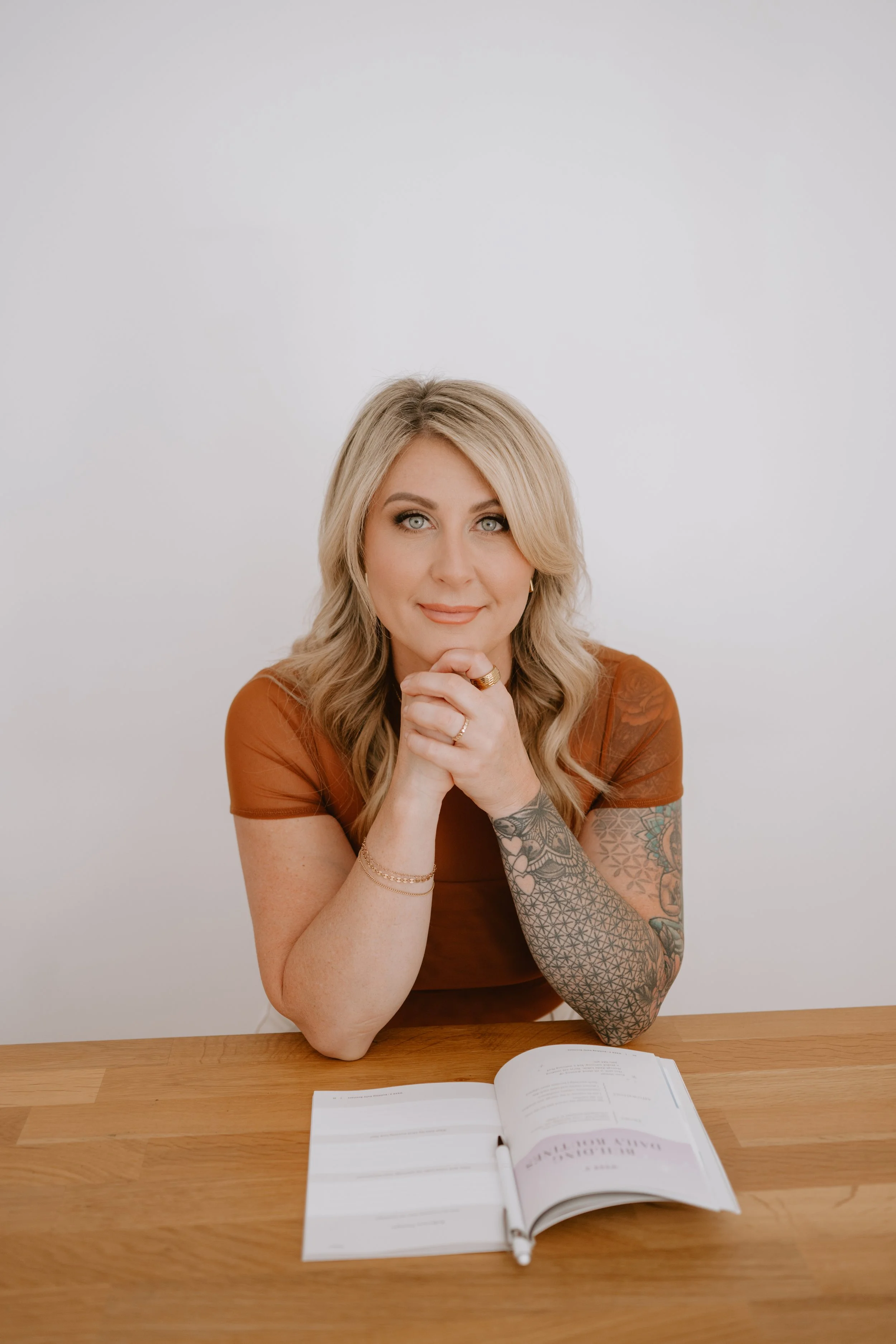 Wellness brand photoshoot showcasing the Aligned AF journal experience for self-discovery and mindset transformation