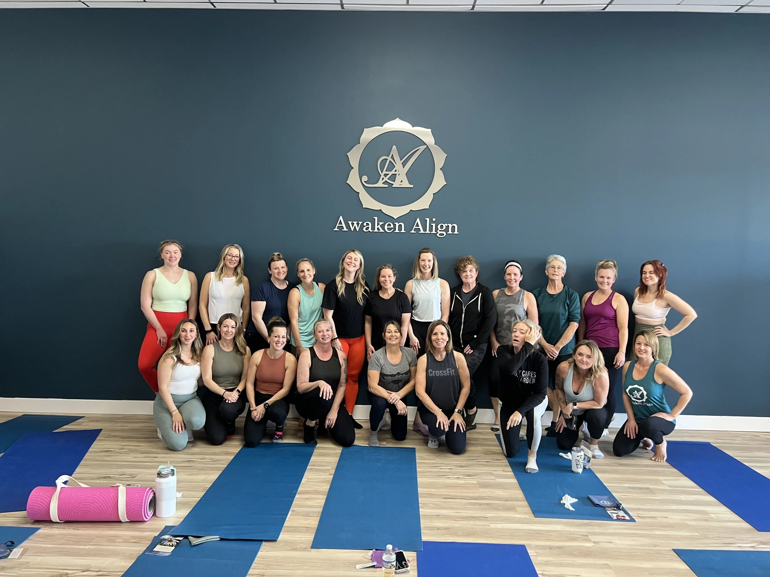 Sweat Crawl community flowing through a guided yoga session centered on breath, balance, and mindfulness