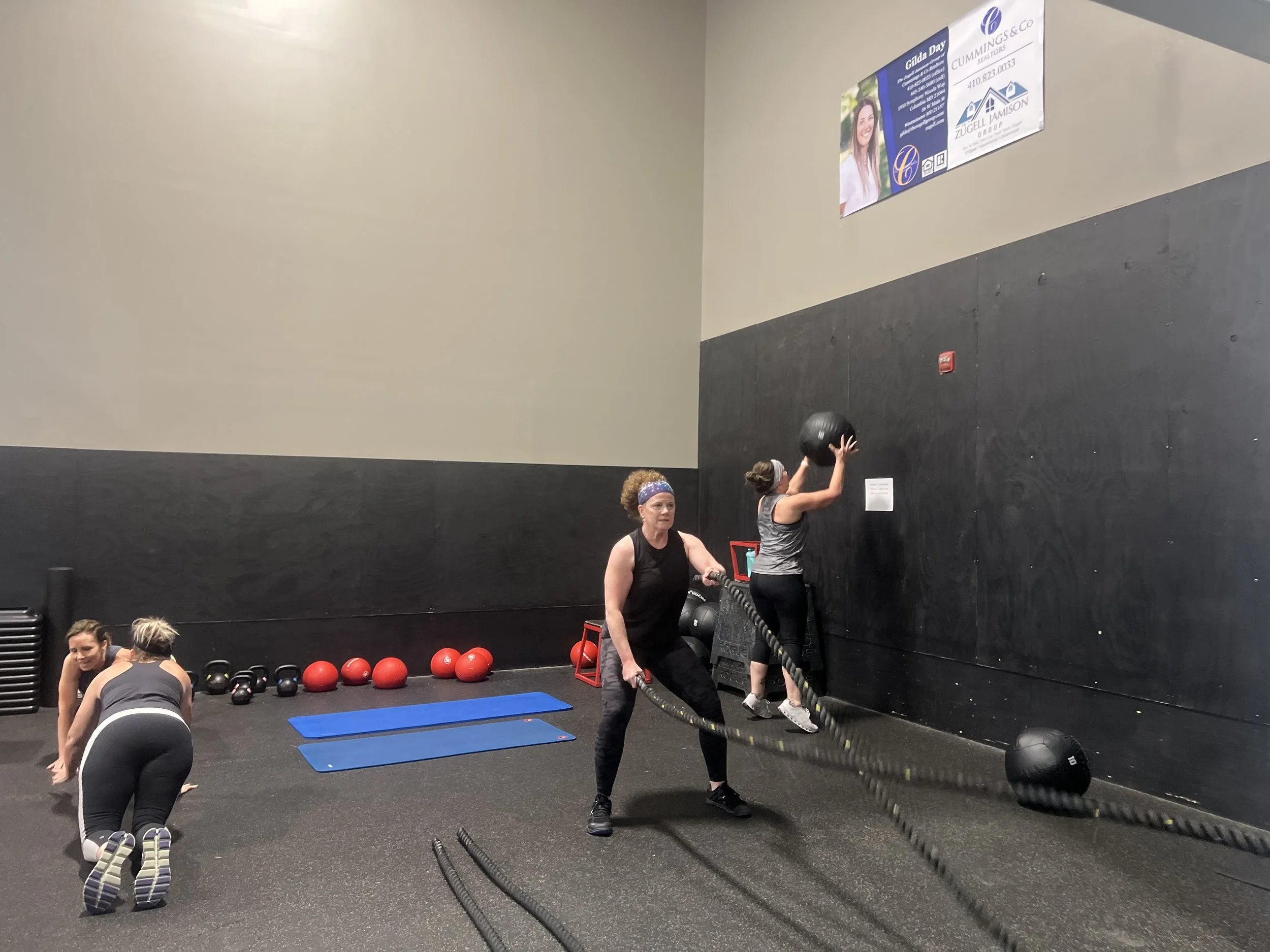 Community fitness experience during the Sweat Crawl at a local training facility
