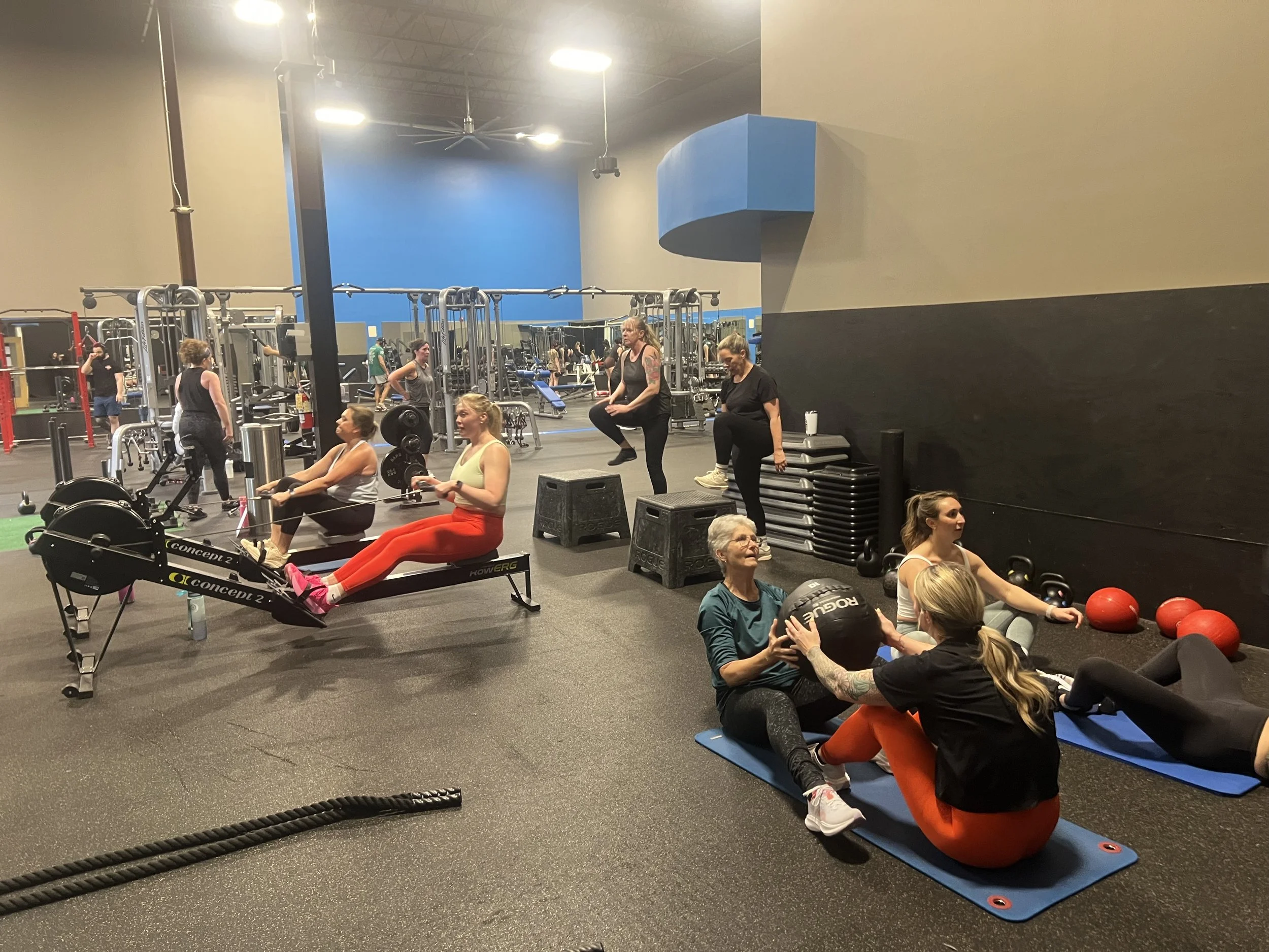 Sweat Crawl group training session focused on strength and endurance at Elevate Gym