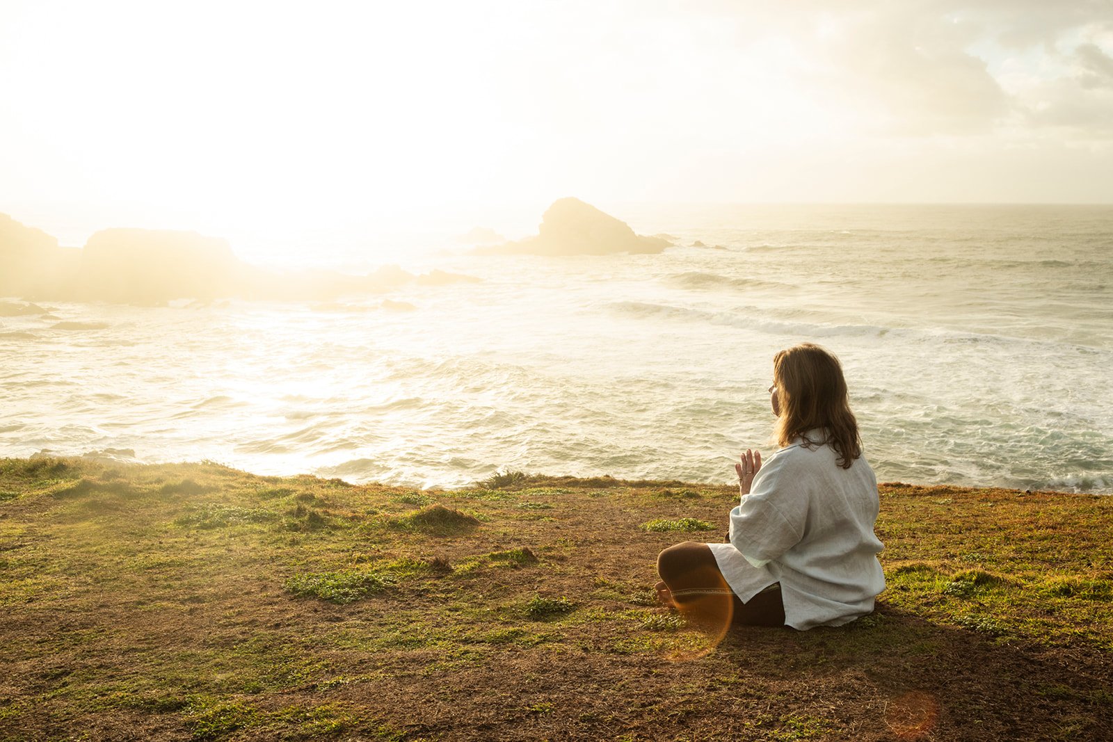 New Day Vibes breathwork and meditation by the ocean at sunset