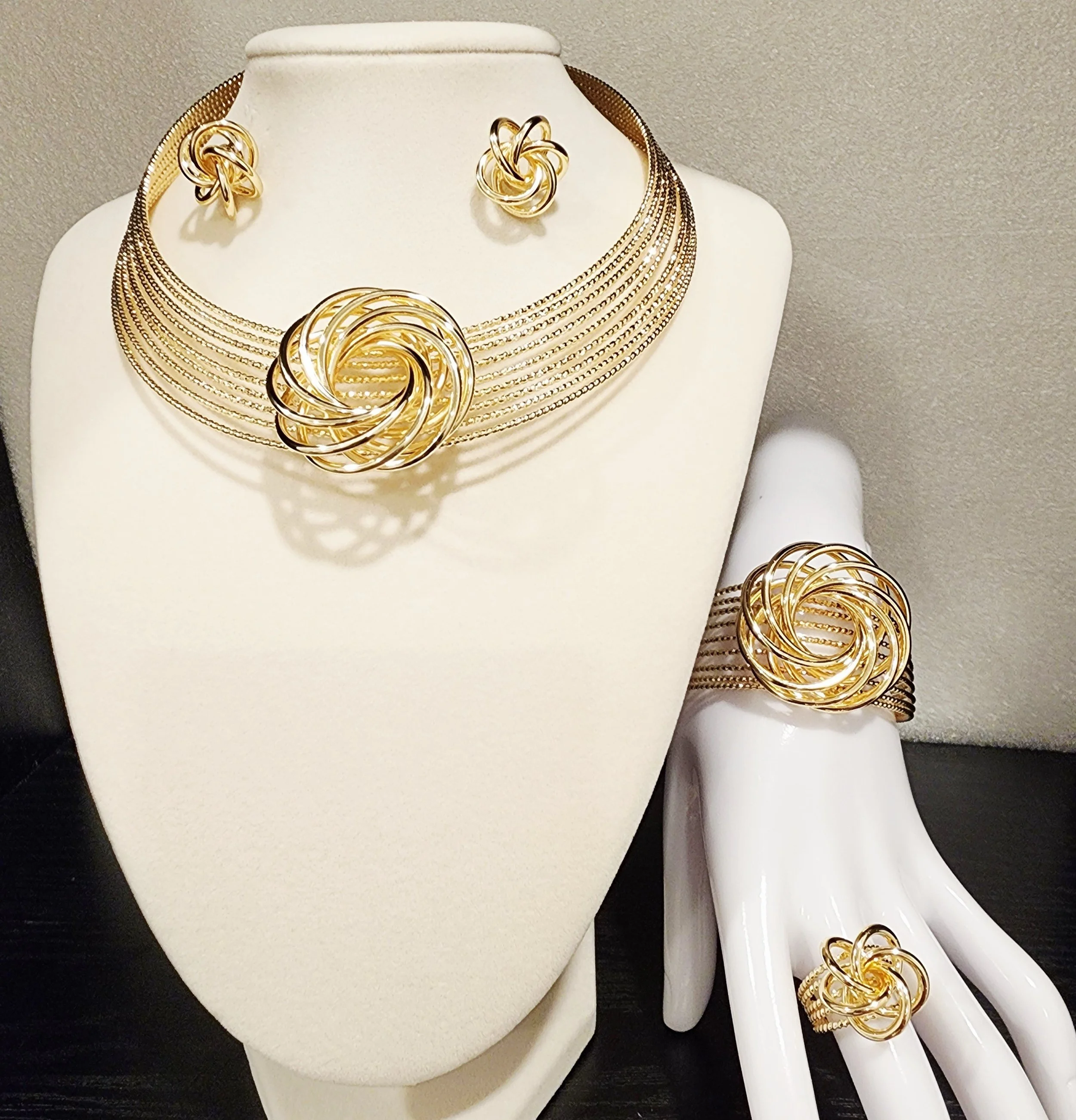 Layered gold choker with donut design