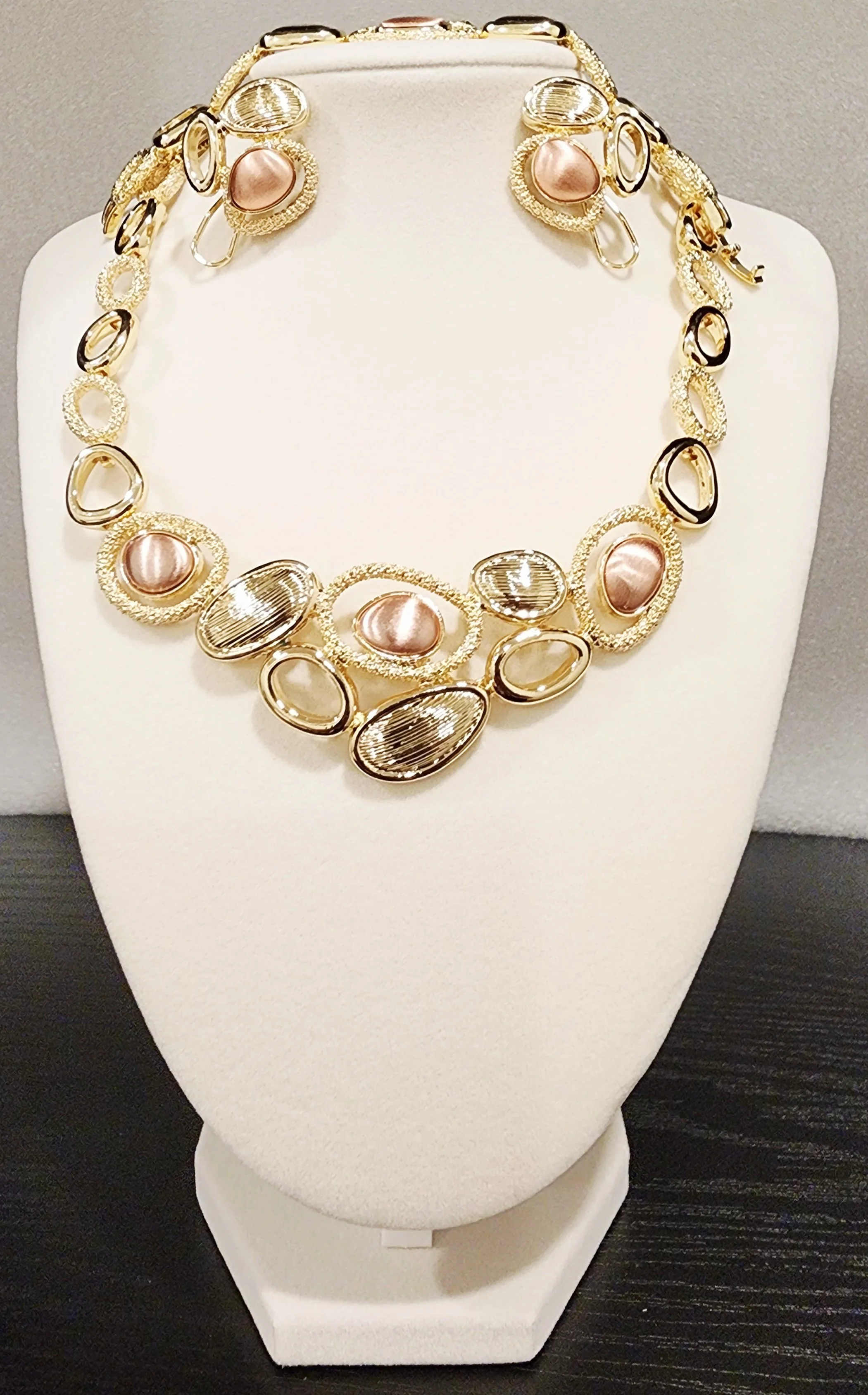 Radiant gold set with coloful stone