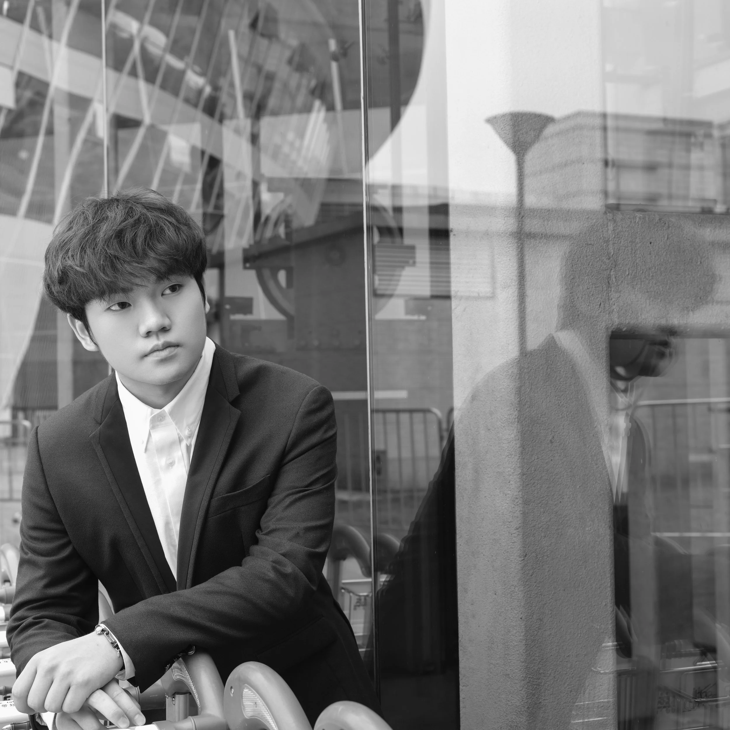 Hao Rao, pianist, black-and-white artistic portrait