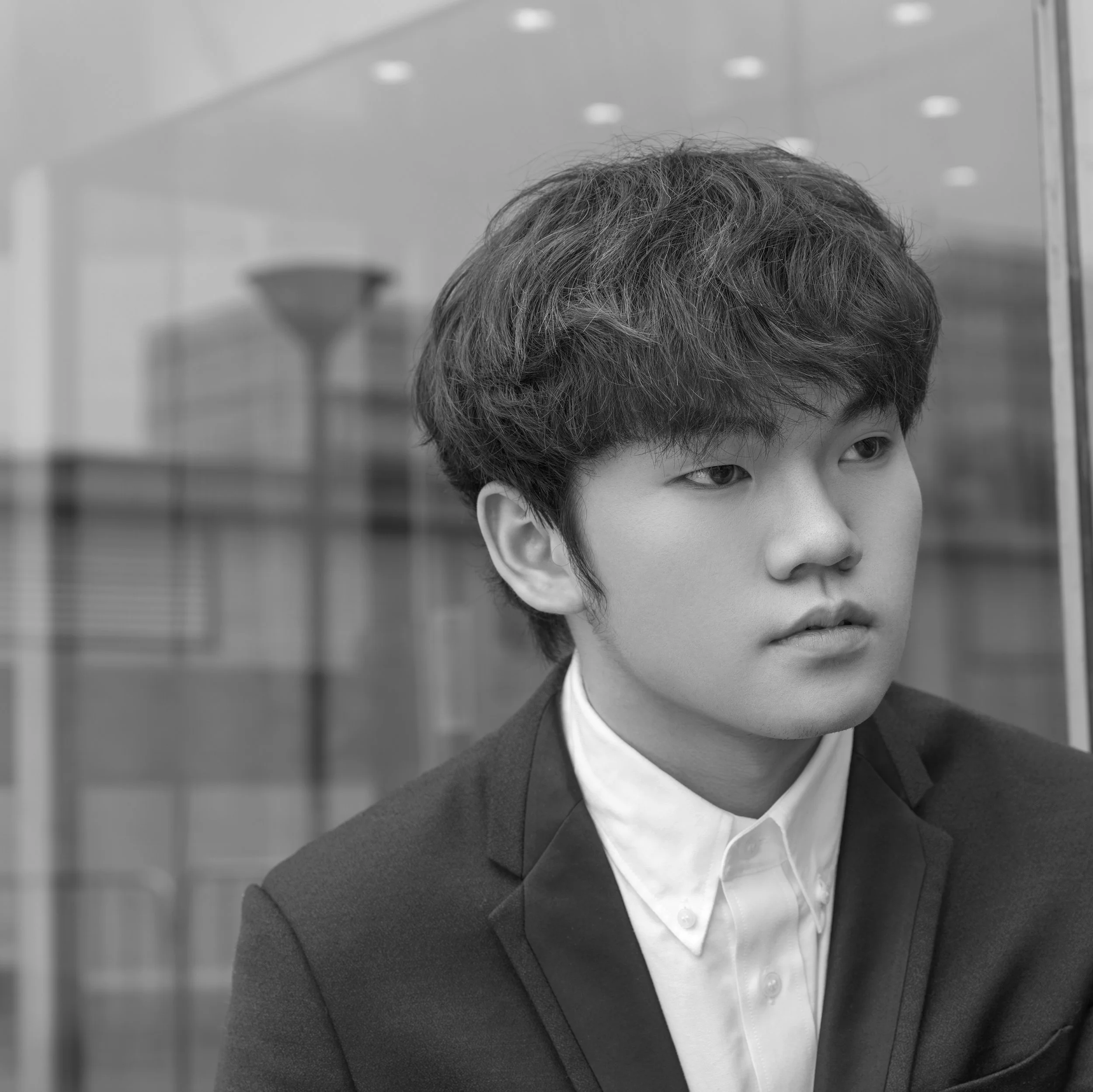 Hao Rao, pianist, black-and-white artistic portrait
