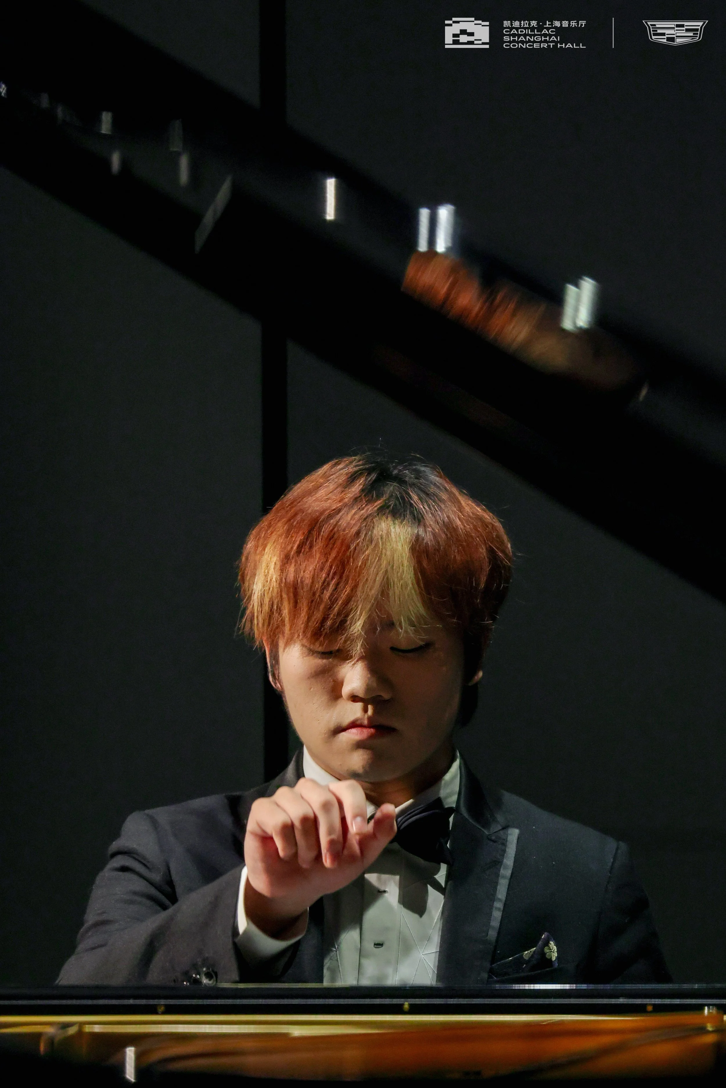 Hao Rao performing piano recital in Shanghai. 