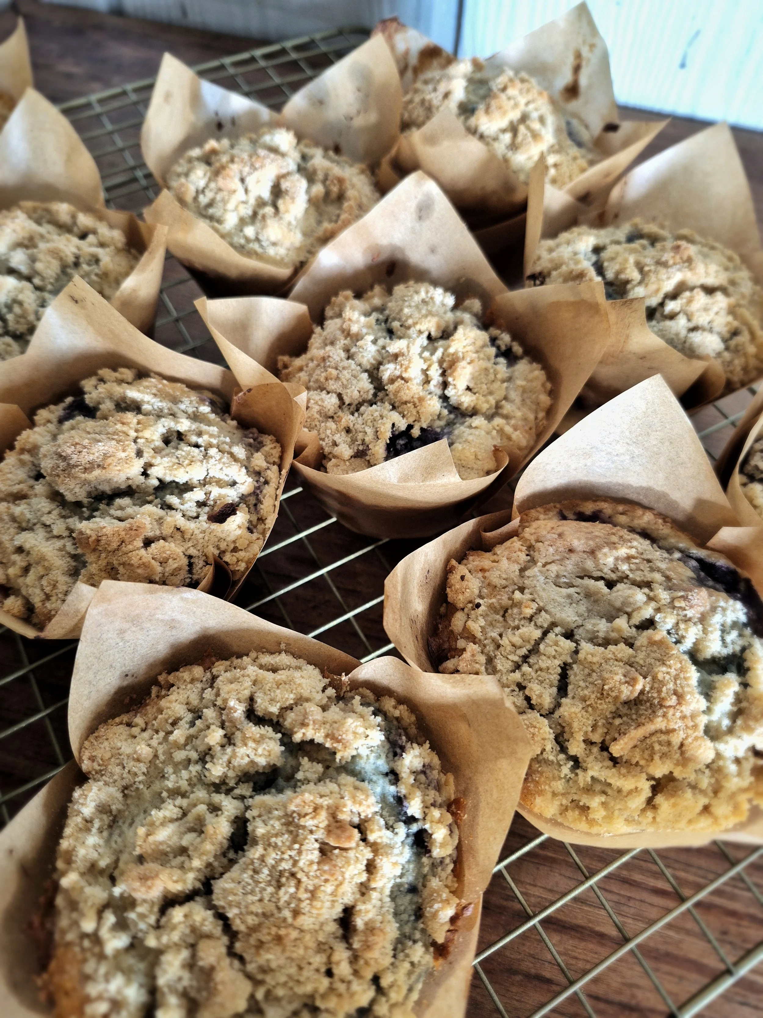 Gluten-free blueberry streusel muffins filled with blueberries and topped with buttery brown sugar streusel from Marigolds & Grace Kitchen in Central Saanich, BC.