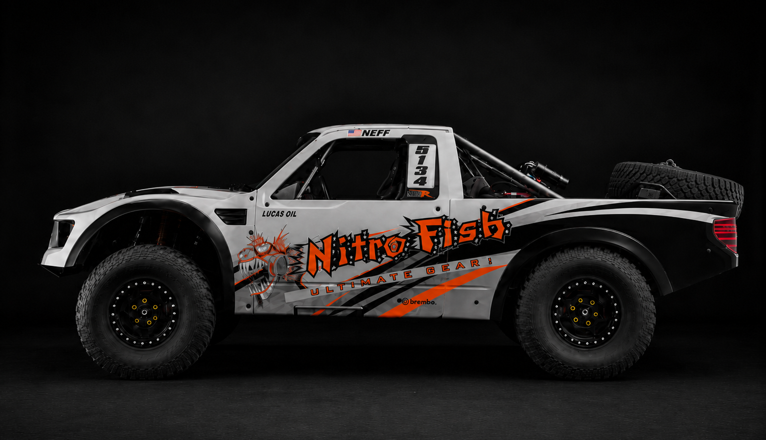 Nitro Fish off-road race truck with custom racing graphics and vehicle wrap by Indy Wrap Works Mike and Chase Neff.