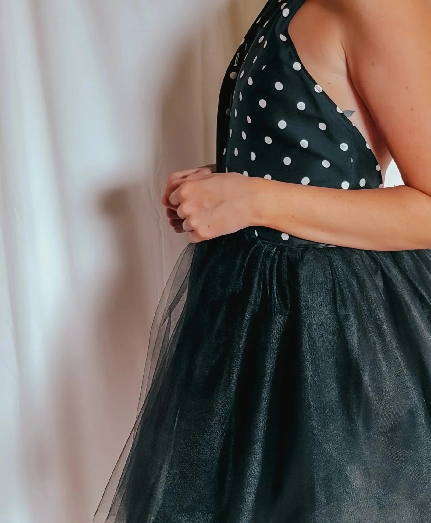 Reworked Vintage dress with black polka dot bodice. Natural waist, halter neck, backless, one-of-a-kind, handmade design by Revibed Vintage.