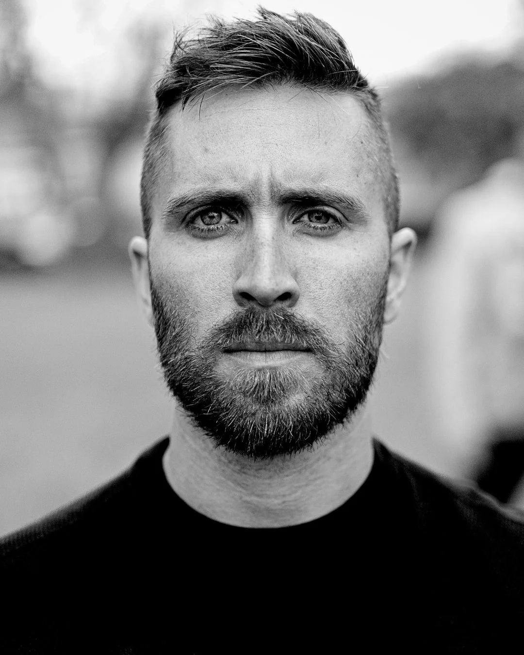 Black and white portrait of Allan McGrath Isbell, sacred relationship and intimacy coach, based in Boulder, Colorado.