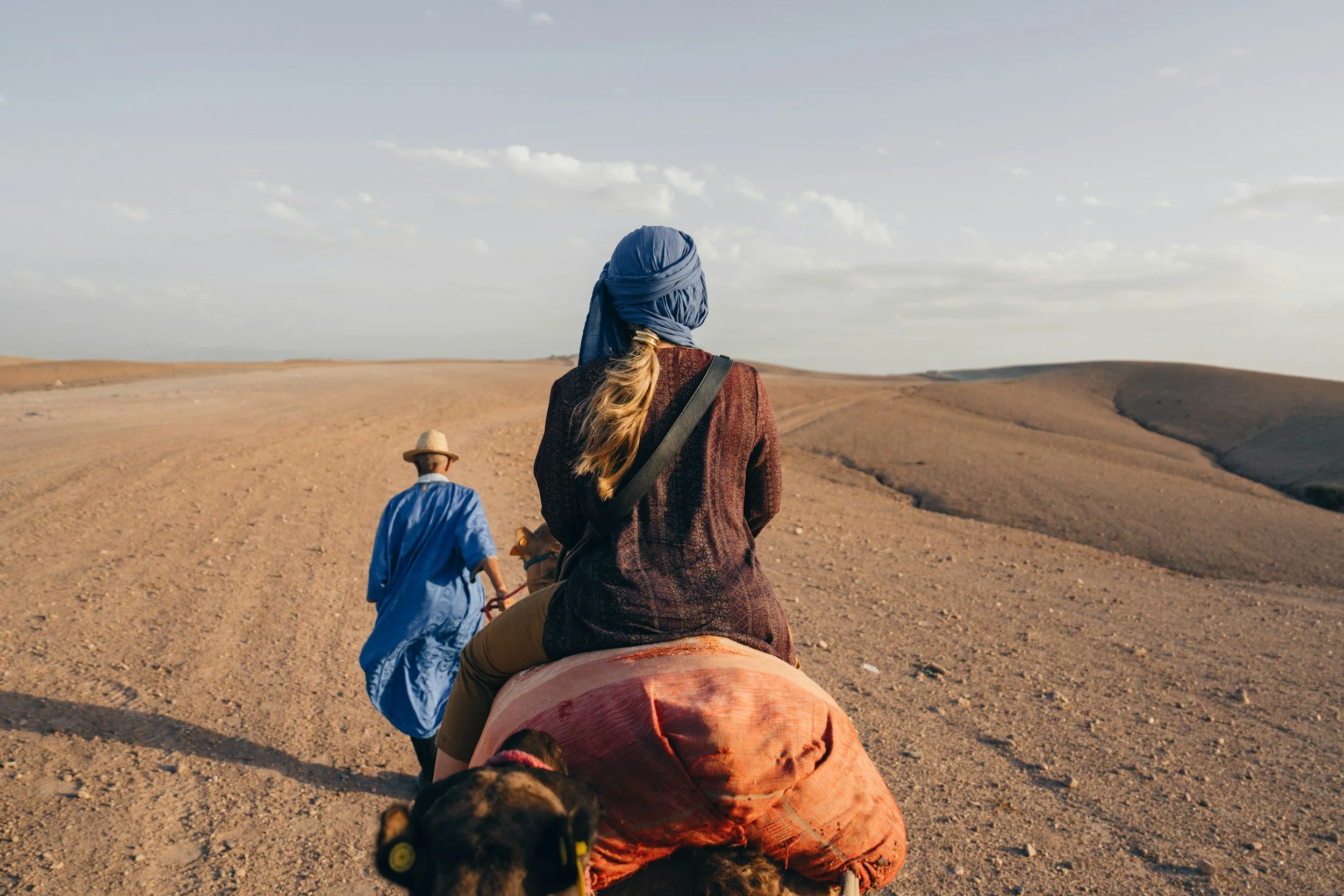 woman riding a camel