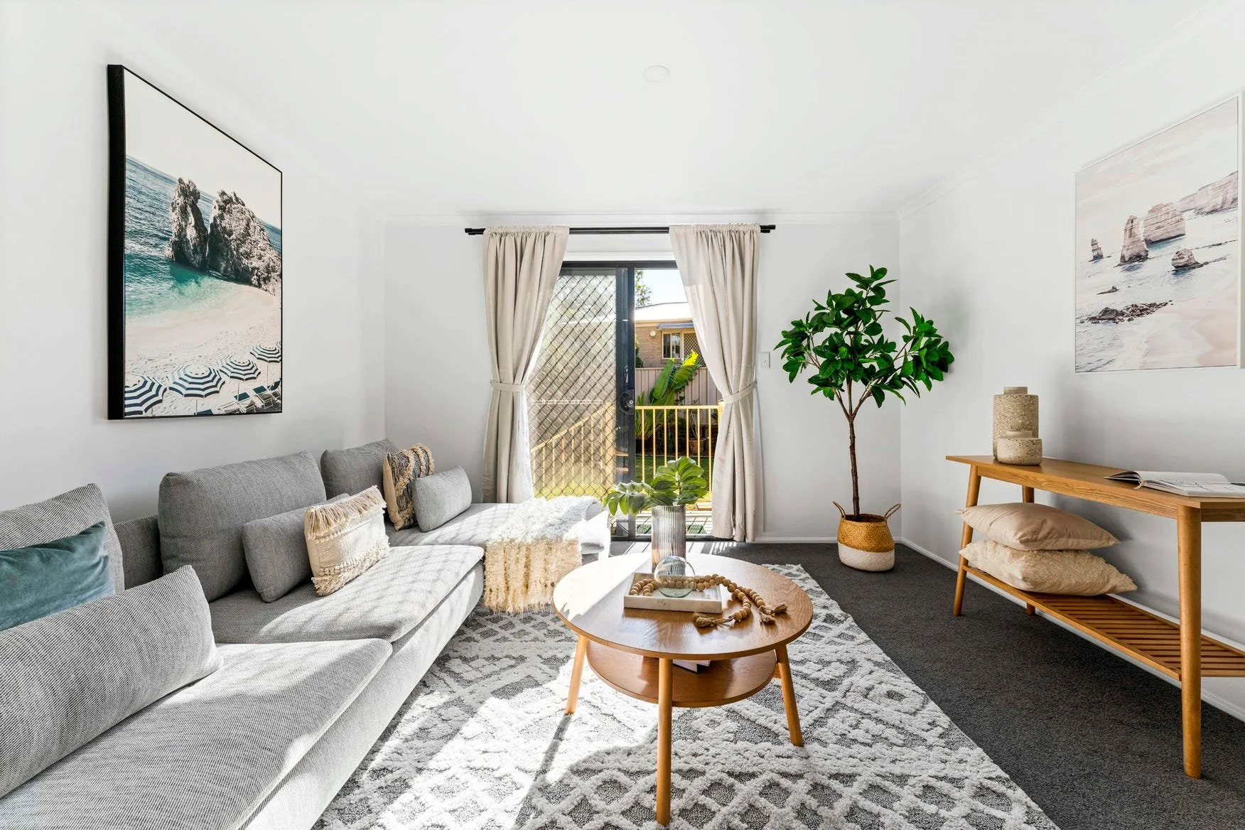 AFTER: Property clear out, internal painting, down light conversion, new carpet, new window furnishings, styling for real estate