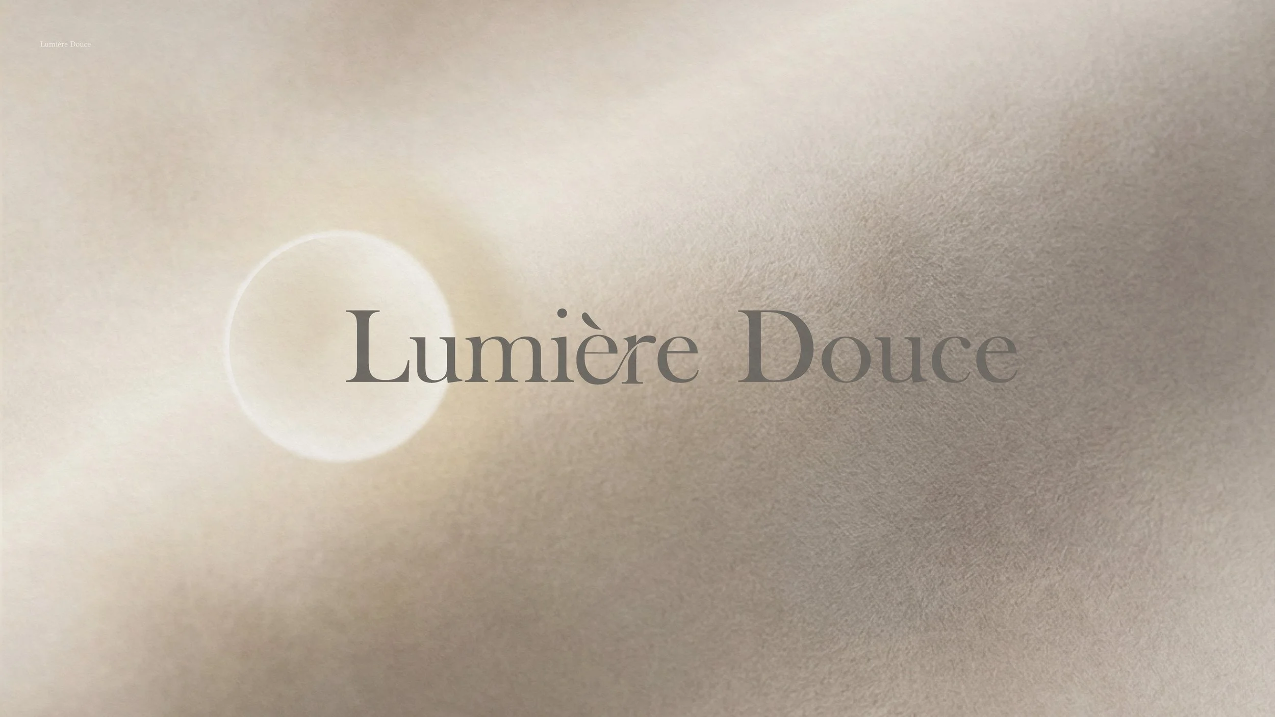 Soft background with subtle light effects and the text 'Lumière Douce' in the center.