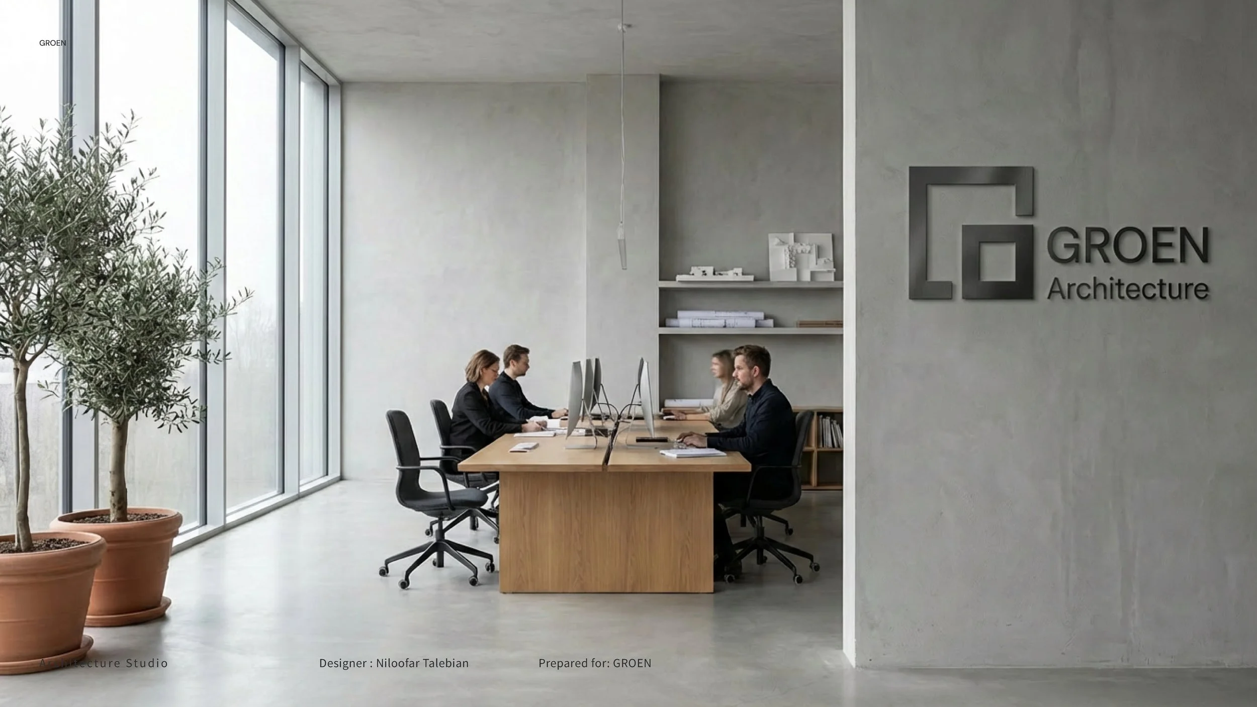Interior view of an office with a large window, four people working at desks with computers, and a wall sign that reads 'GROEN Architecture' in a modern, minimalist design.