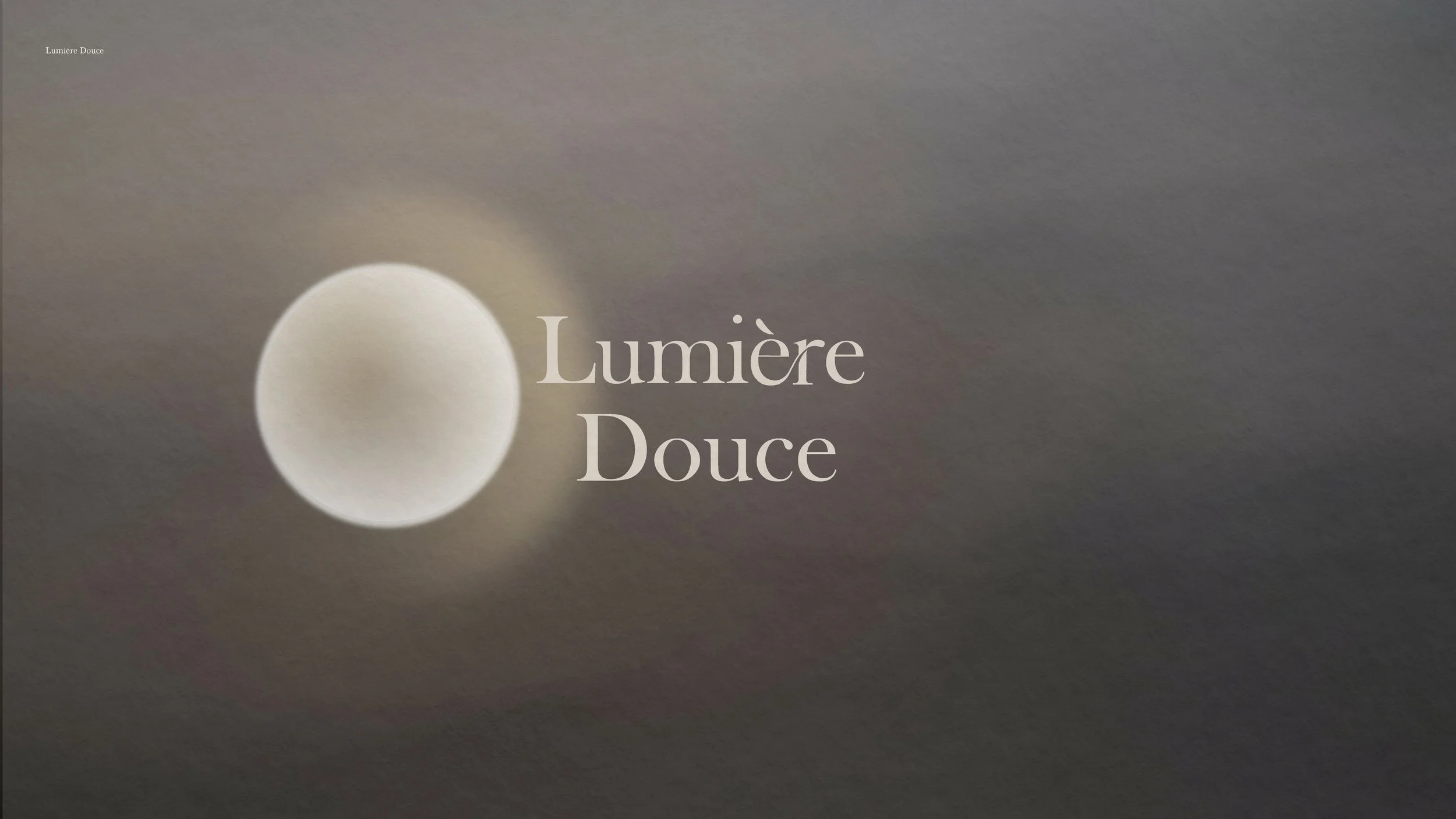 A blurred image of a bright, glowing moon with a soft halo around it, and the text 'Lumière Douce' in the center.
