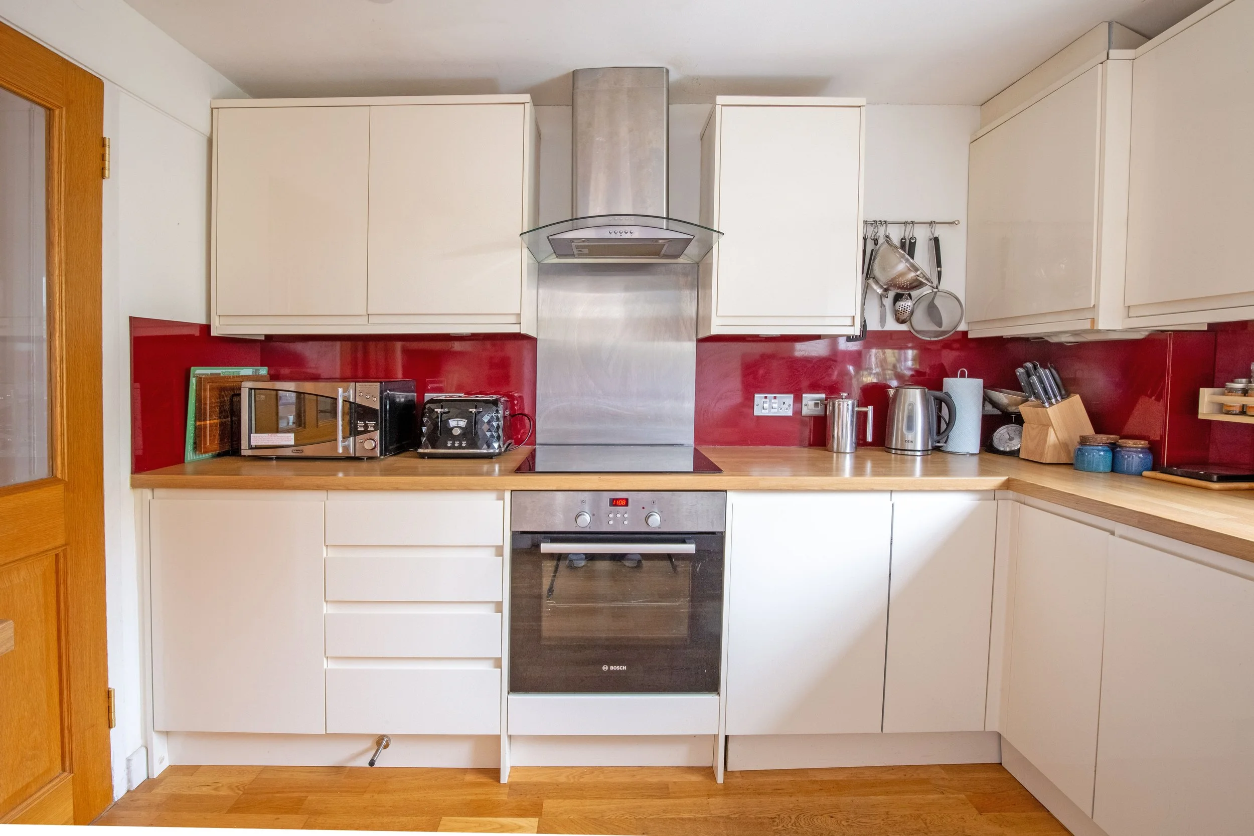 Kitchen. Microwave, toaster, electric oven, induction hob, kettle, dishwasher, washing machine, fridge, and the other things you find in a kitchen. 