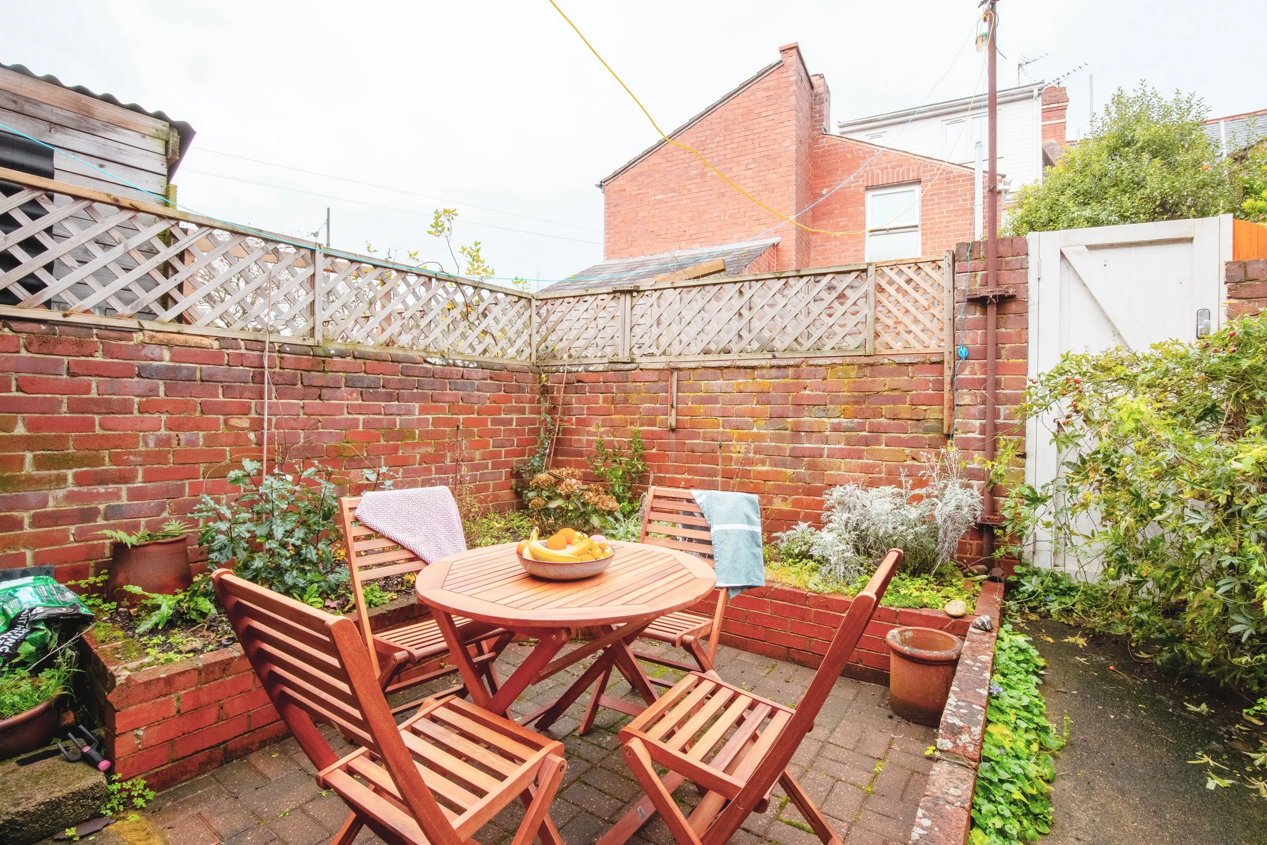 Courtyard garden. You'll find the table and chairs in the small utility room next to the kitchen along with the tumble dryer.