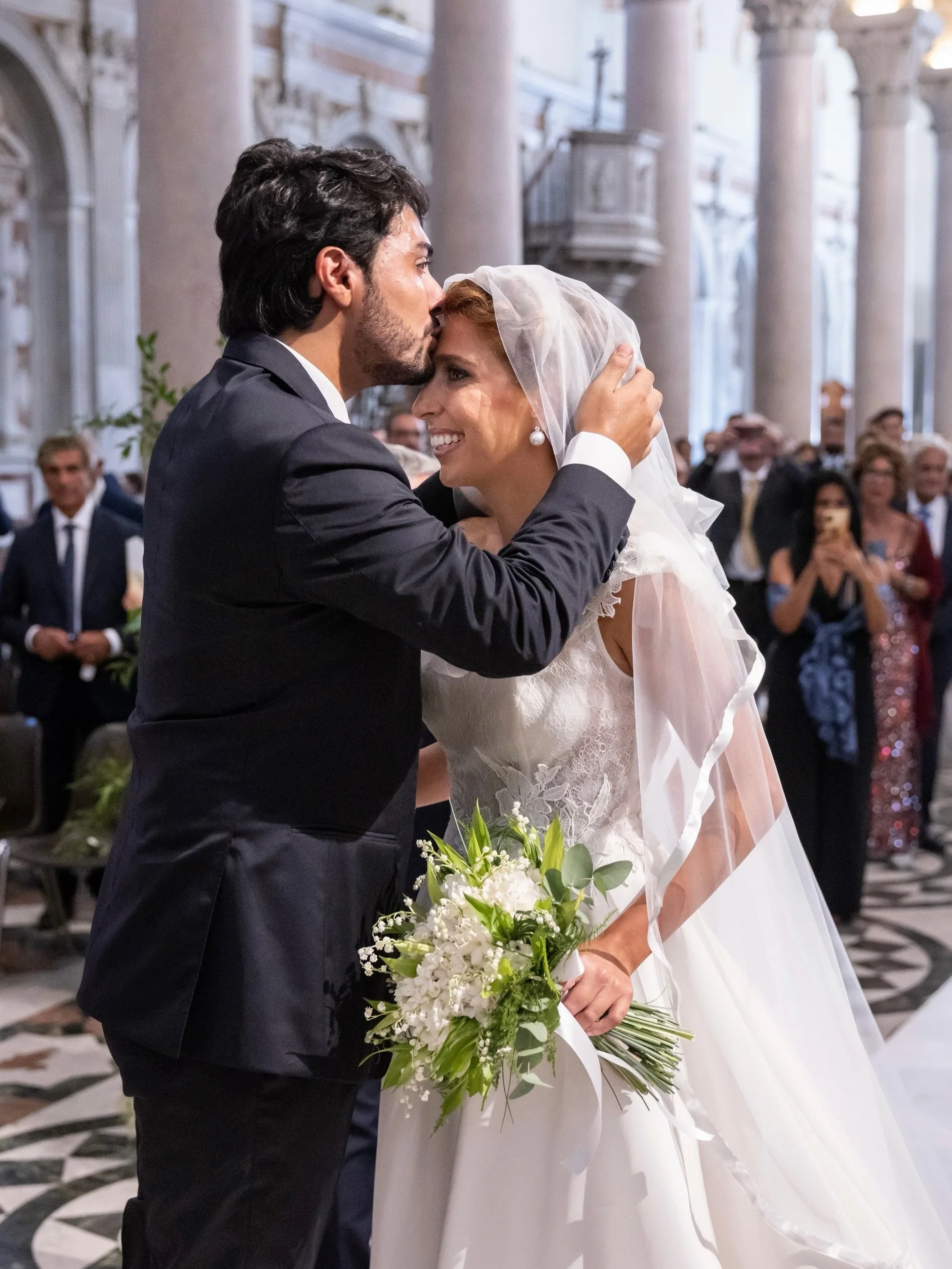 Some love stories don&rsquo;t need grand words.

They are told through a gentle touch, a knowing glance, a promise whispered beneath centuries-old arches.

Surrounded by timeless beauty and delicate white blooms, Emanuel &amp; Ludovica celebrated a d