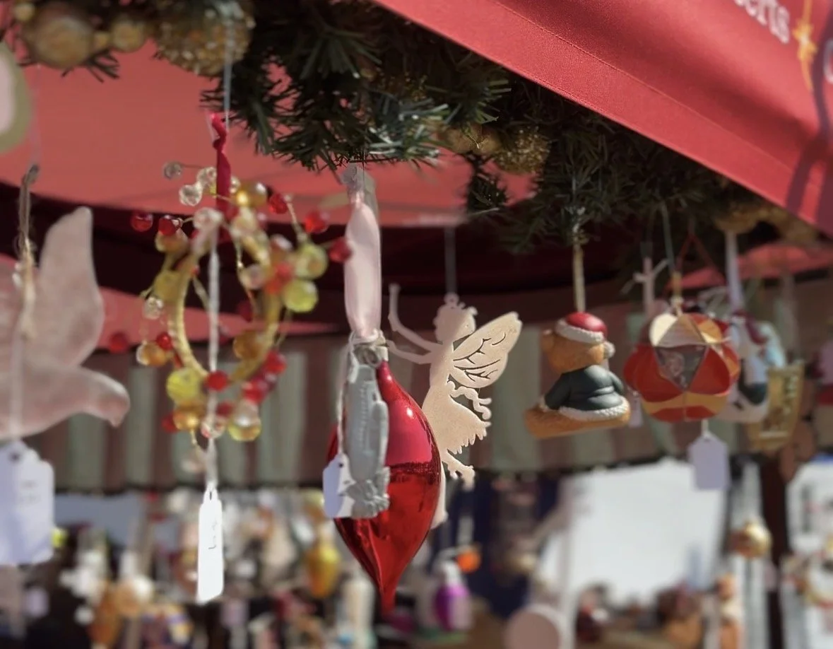 The Merry Berry Confectionery Booth appears with Christmas Ornaments and Christmas Cookies at markets and festivals around Raleigh, NC and Boone, NC