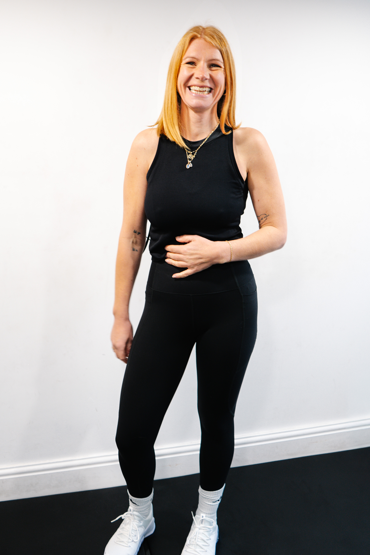 Ruby Tuttlebee personal trainer East London smiling in studio
