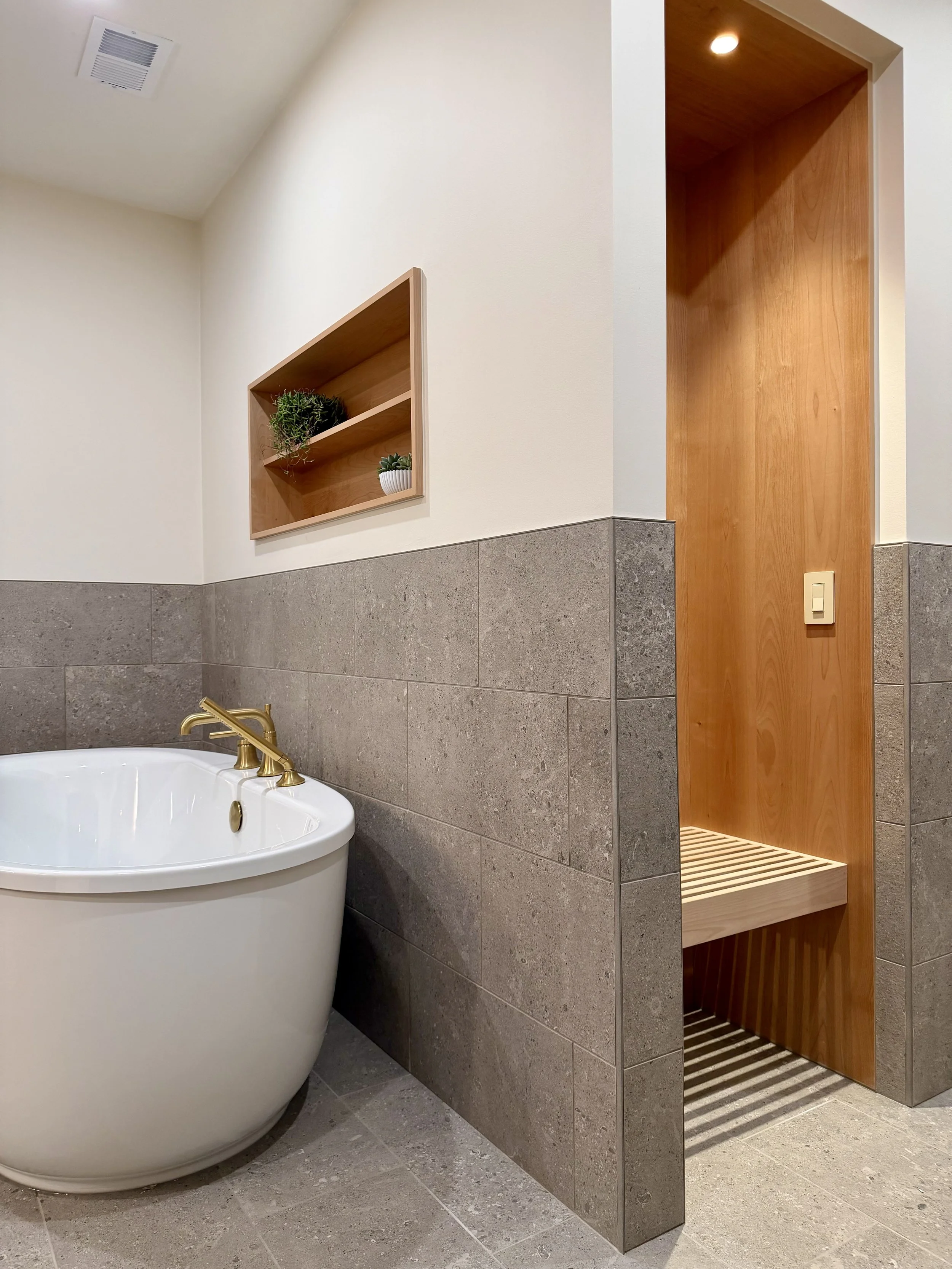 Left:

Kohler Soaking Tub Alcove with Purist Fixtures and 3/4" Edge-banded Alder Plywood Shelving Detail Finished with Centurion 2K Polyurethane. 

Right:

Custom Built Linear Changing Bench in 3/4" Alder Hardwood with Perimeter Wrapped in 3/4" Alder
