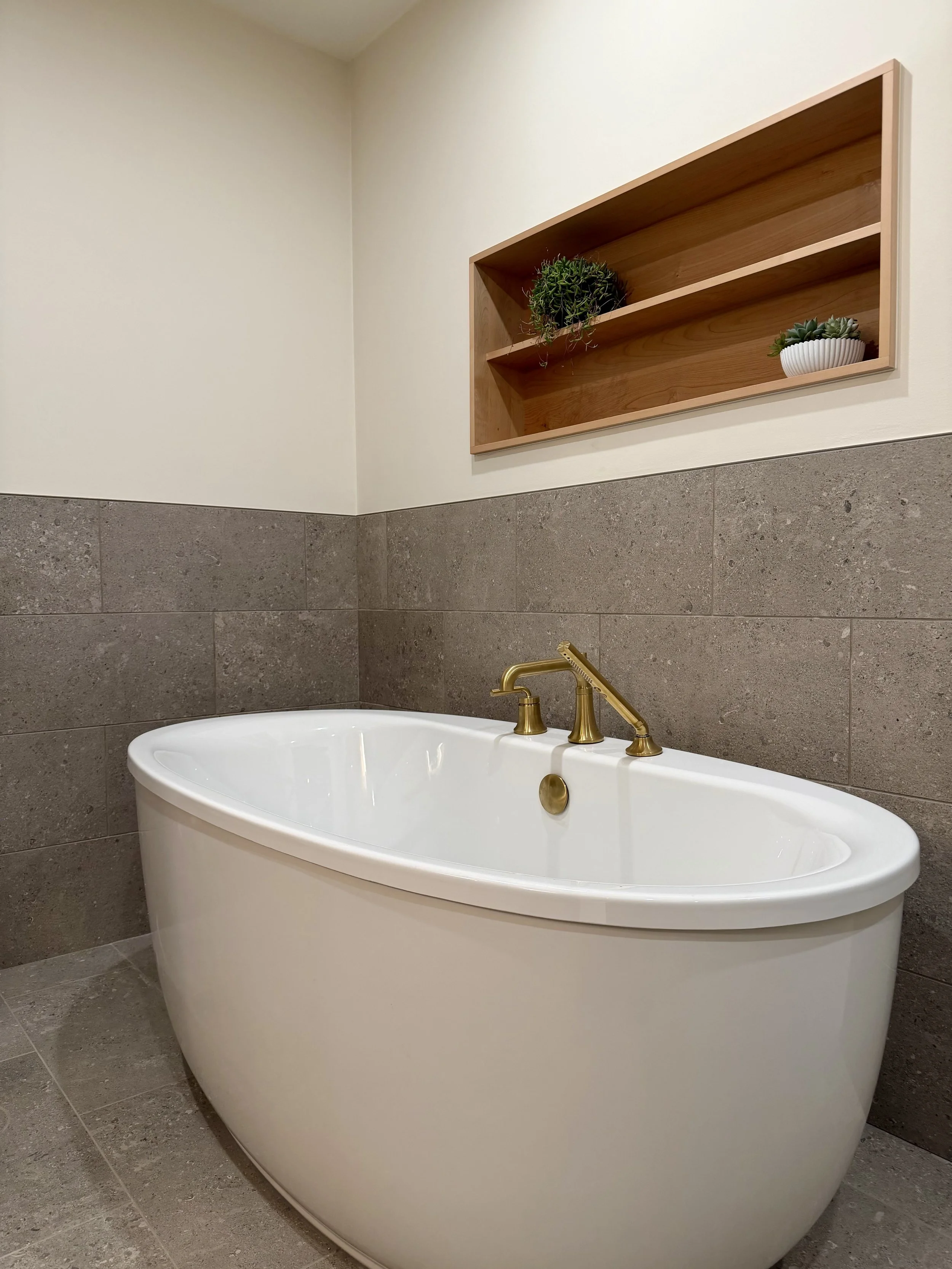 Kohler Soaking Tub Alcove with Purist Fixtures and 3/4" Edge-banded Alder Plywood Shelving Detail Finished with Centurion 2K Polyurethane. 

Thermostatically Controlled Heated Floors Using Schluter DITRA-HEAT.

Scandinavian Inspired Bathroom Remodeli