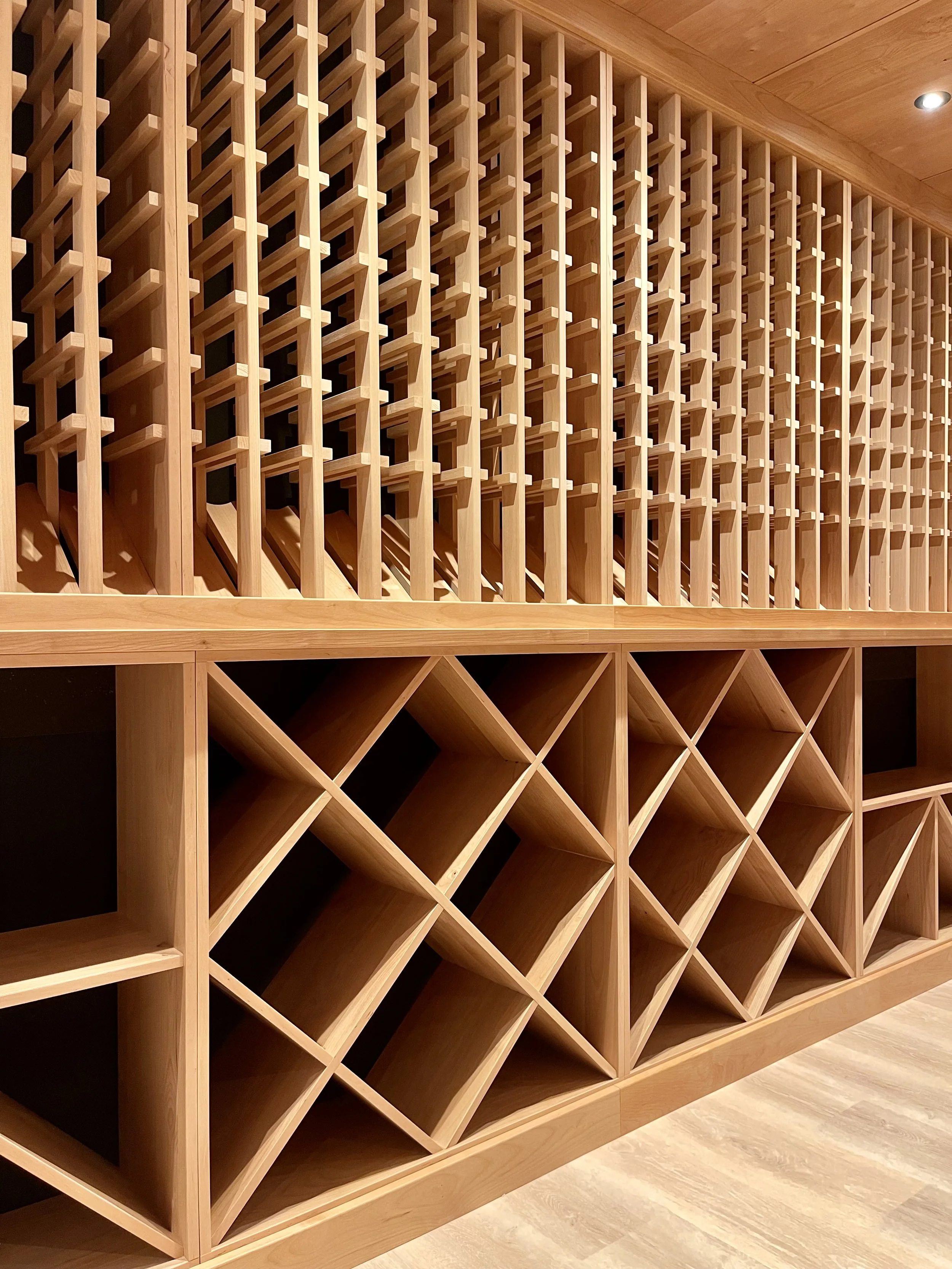 2000 Bottle Climate Controlled Custom Wine Cellar in Alder with Matte Black Background.

Custom Wine Cellar Project Completed in Northville MI. 