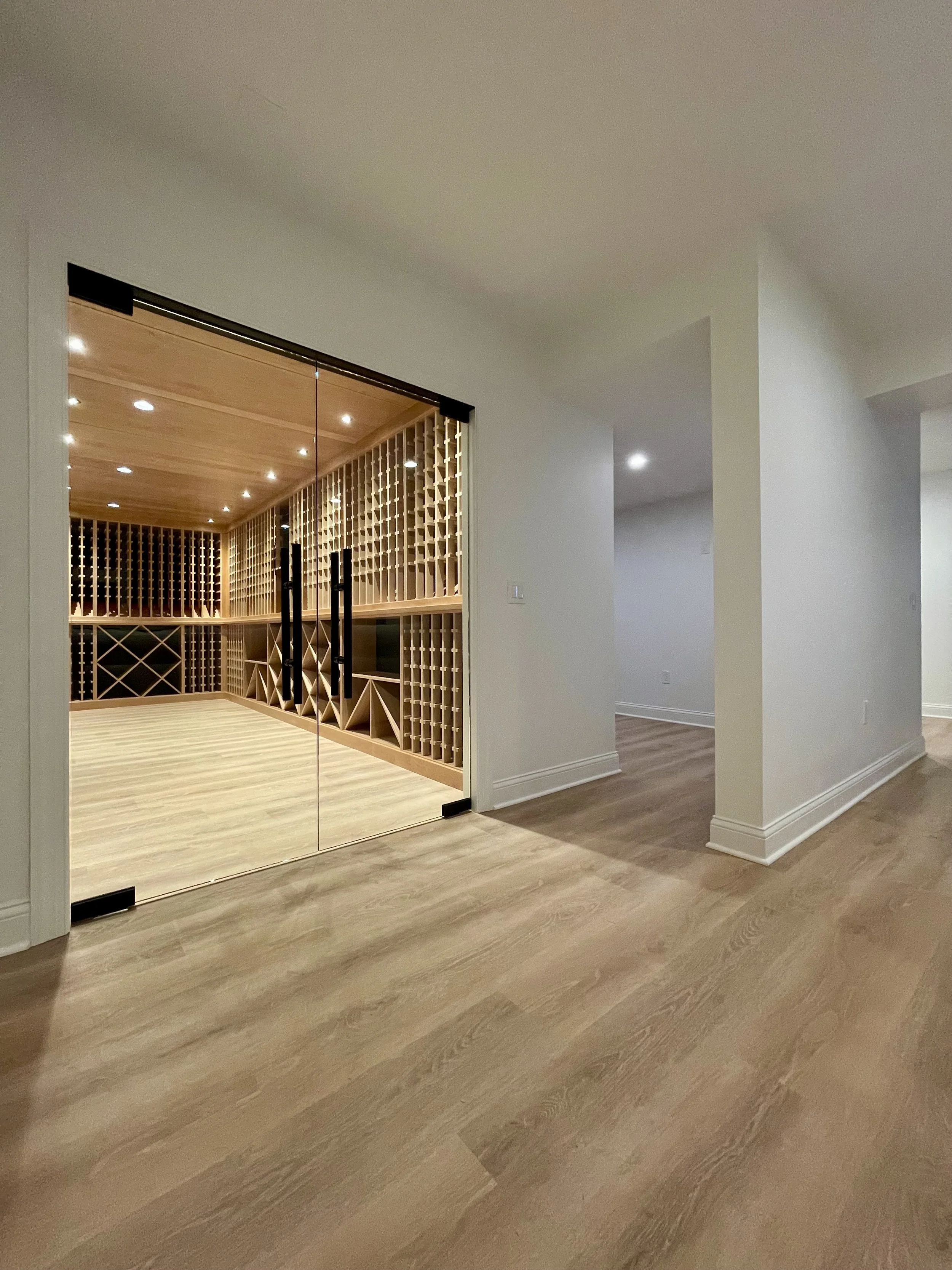 2000 Bottle Climate Controlled Custom Wine Cellar in Alder with Matte Black Background.

Custom Wine Cellar Project Completed in Northville MI. 