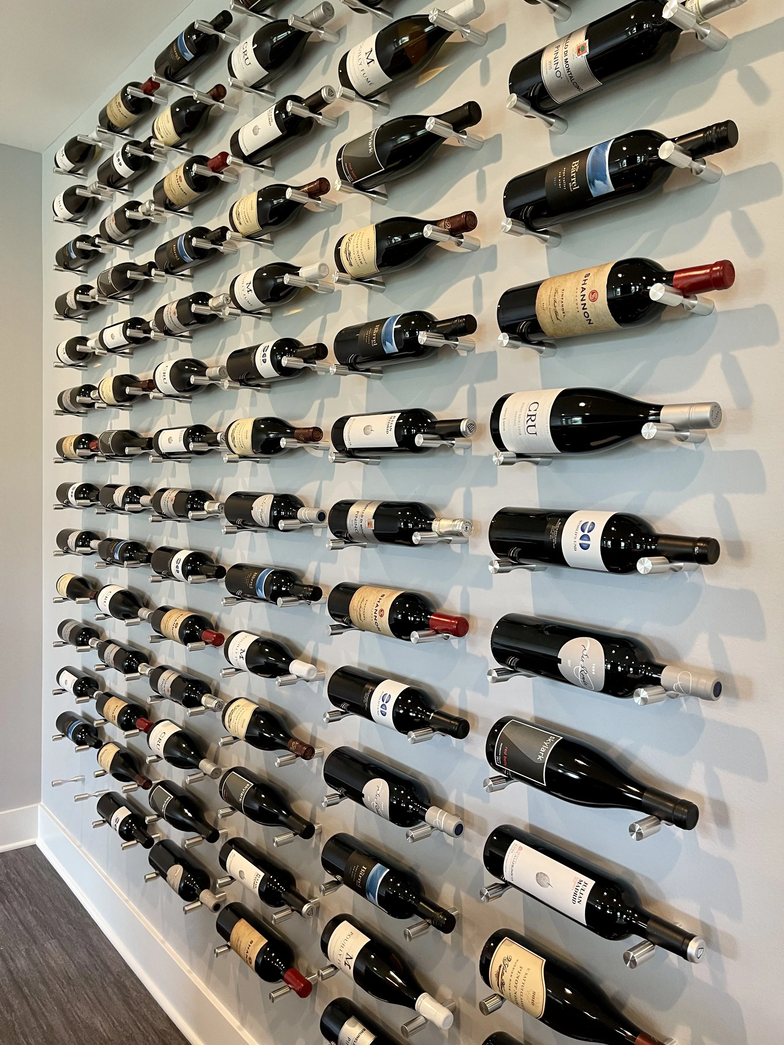 Custom Built Wine Display Wall 

Scandinavian Inspired Remodeling Project With Custom Sauna and Steam Shower Completed in Northville MI. 