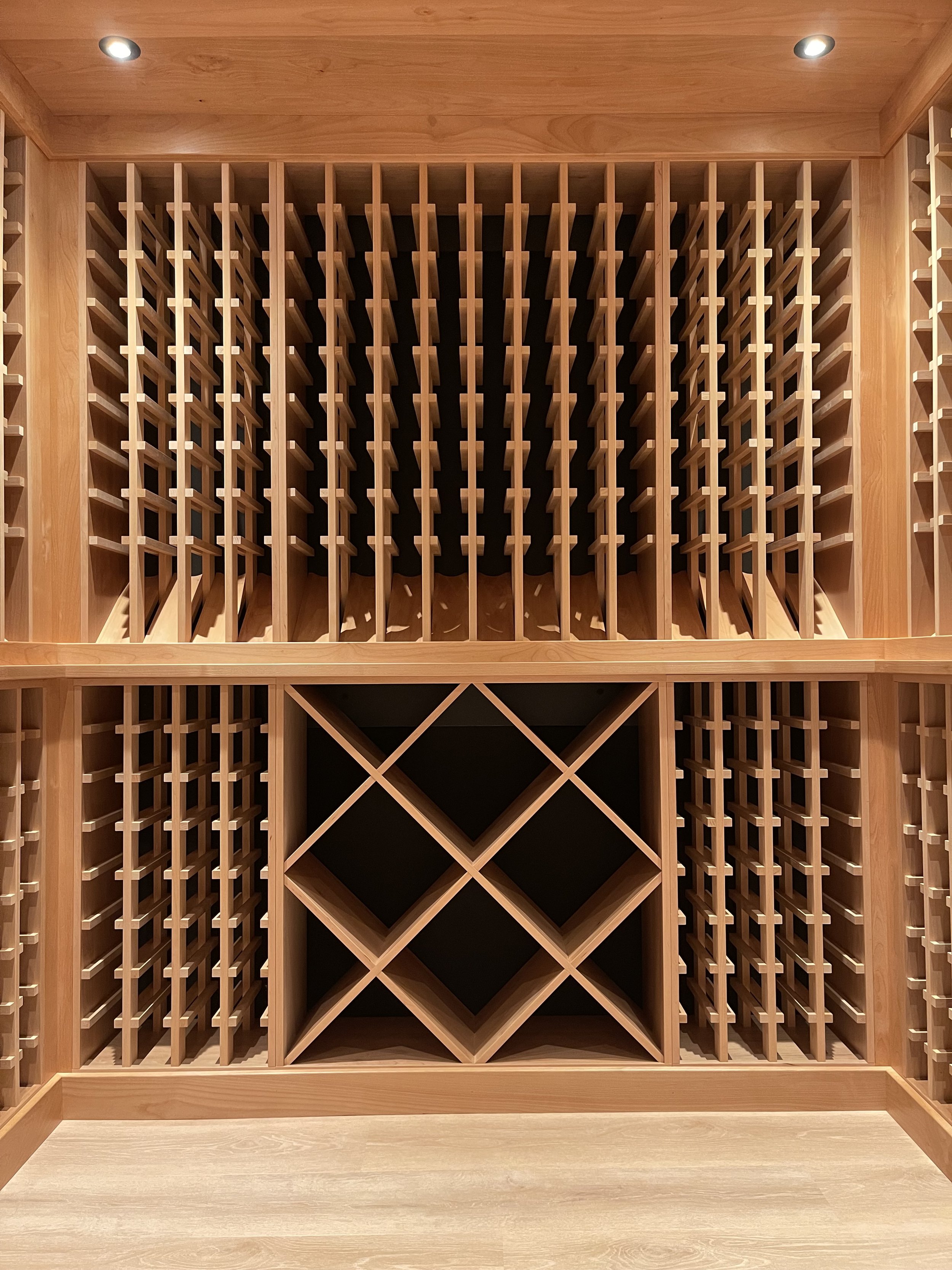 2000 Bottle Climate Controlled Custom Wine Cellar in Alder with Matte Black Background.

Custom Wine Cellar Project Completed in Northville MI. 