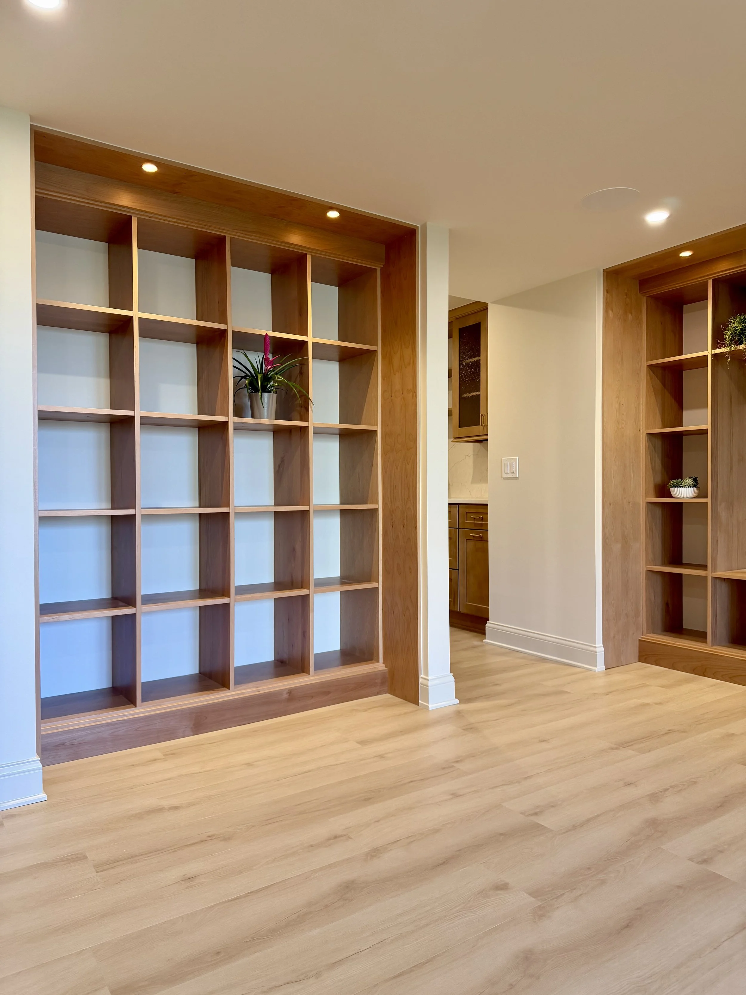 Completed 3/4" Alder Plywood Built-In Shelving Units Constructed Using Lamello Divario Fasteners with Painted Backing Wall and 2" Recessed Lighting Fixtures Painted to Match 

Scandinavian Inspired Remodeling Project Completed in Northville MI. 