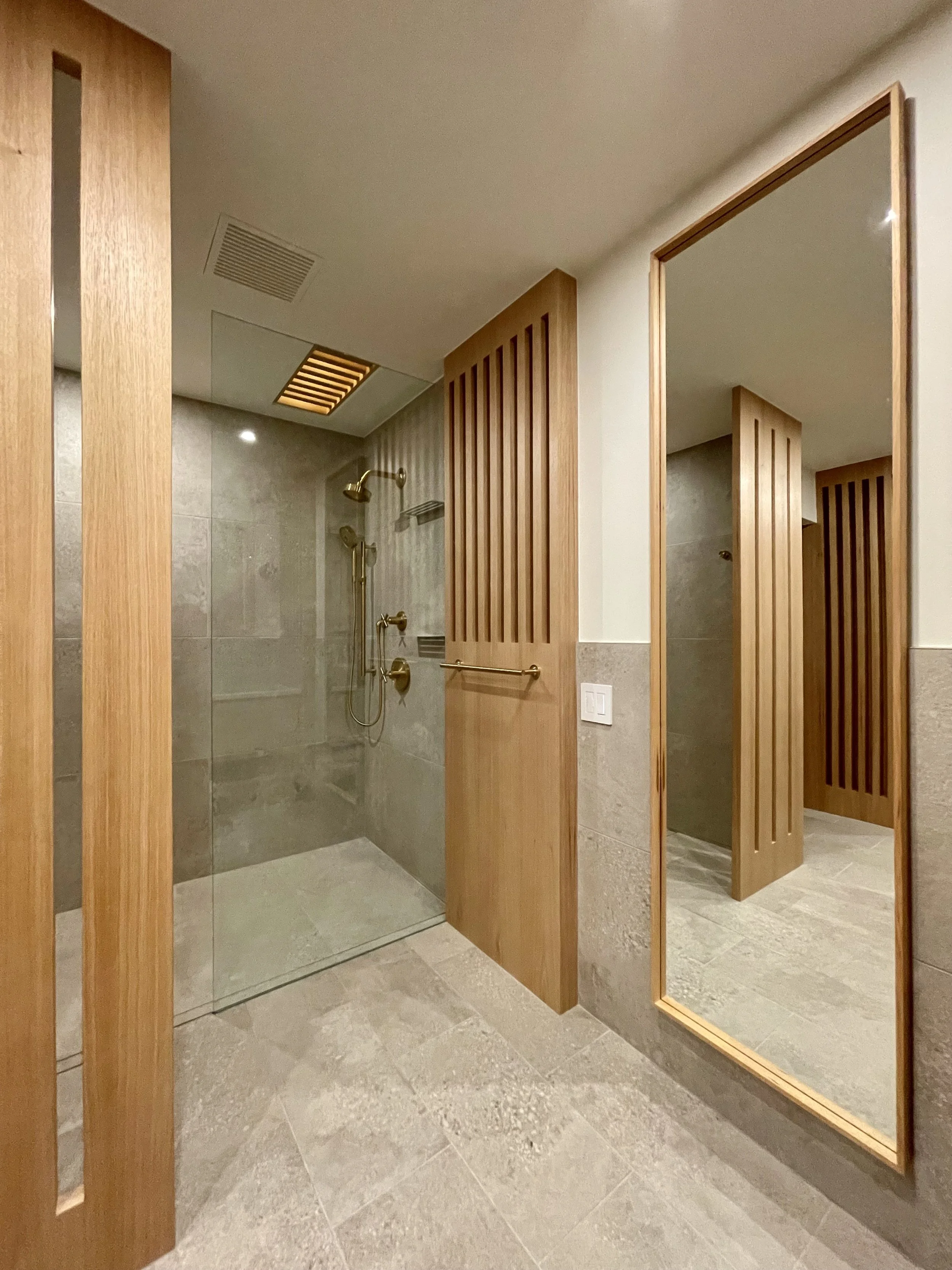 Architectural Details in Uniform Hickory Veneer and Hickory Heartwood Finished with Centurion 2K Polyurethane.

Wall Mounted Fixtures are Kohler Purist in Vibrant Brushed Modern Gold. 

Scandinavian Inspired Bathroom Remodeling Project Completed in N