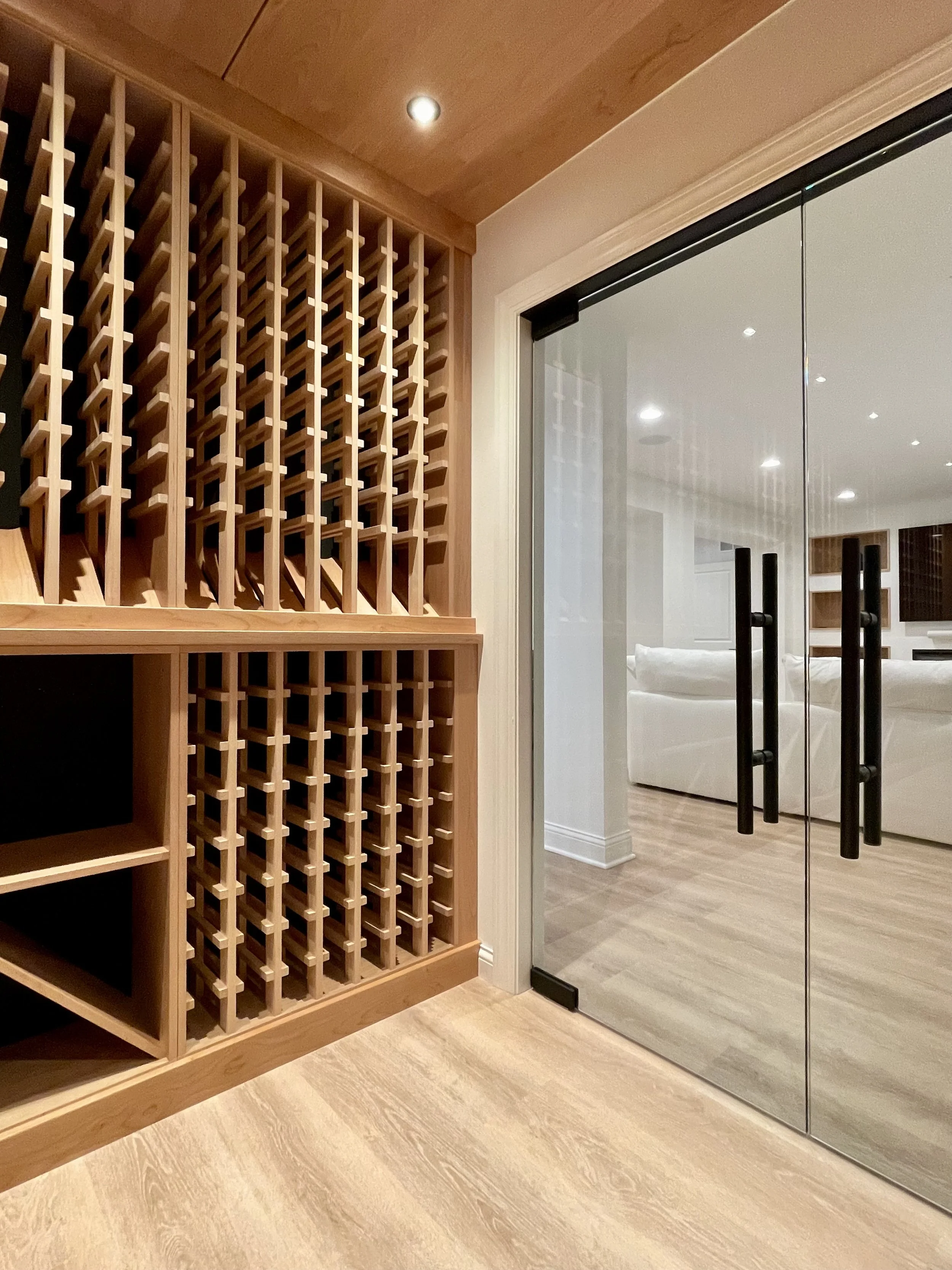 2000 Bottle Climate Controlled Custom Wine Cellar in Alder with Matte Black Background.

Custom Wine Cellar Project Completed in Northville MI. 