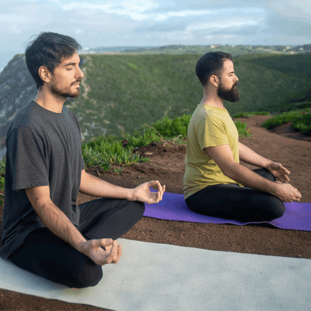 People meditating during spiritual awakening to discover life purpose and inner alignment. Using the Divine Purpose Awakening System, our clients will get a clear path to embrace their Divinity and discover their life purpose to live authentically.