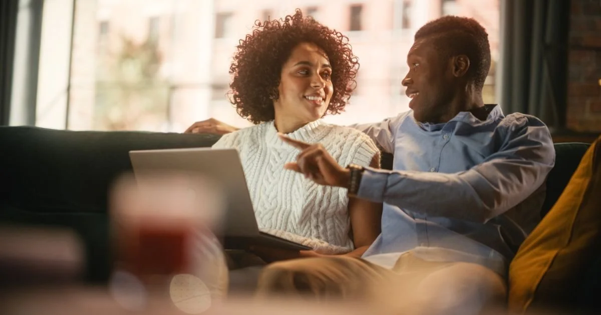 Blended couple discussing money decisions